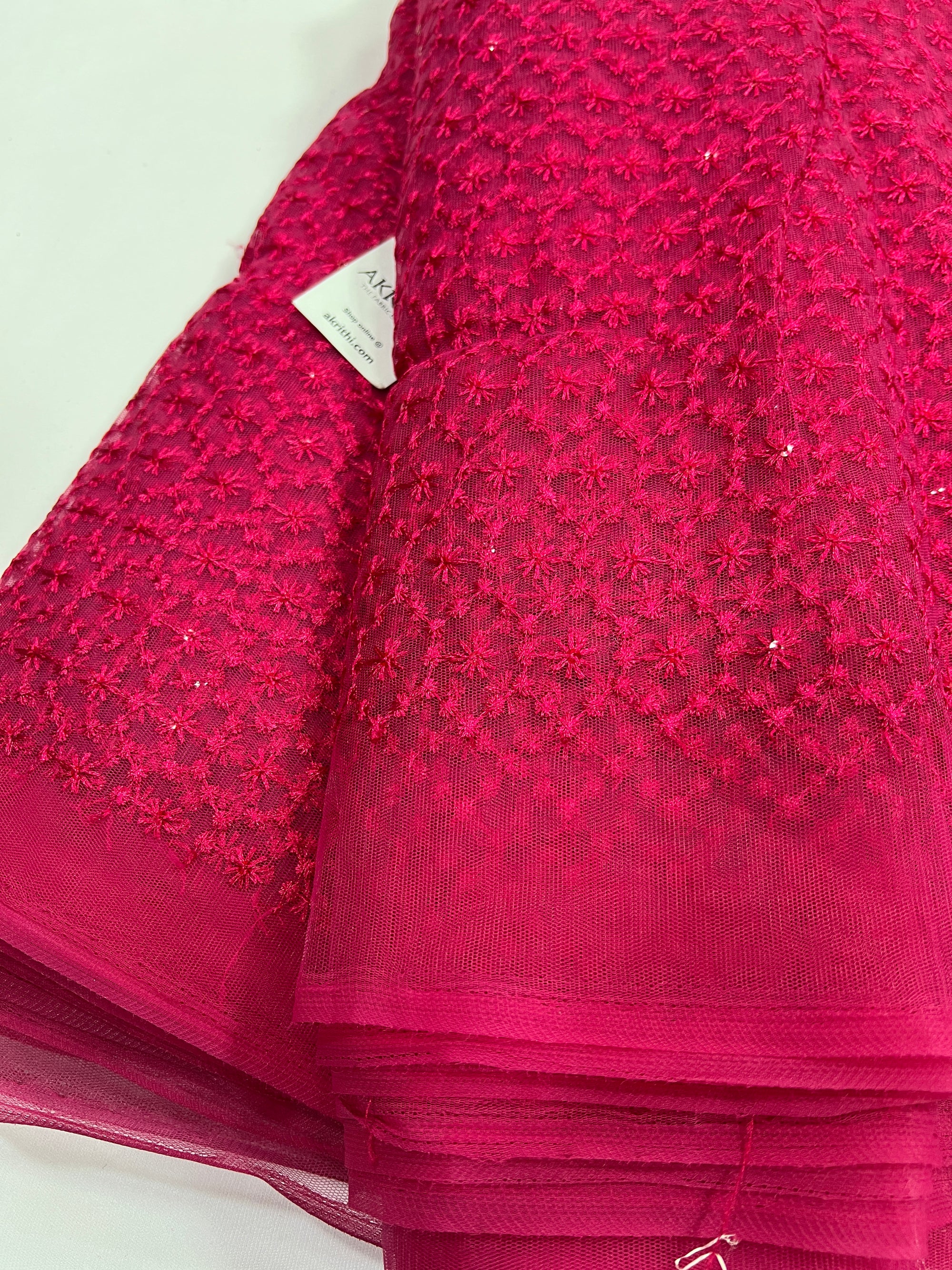 Embroidery on net fabric