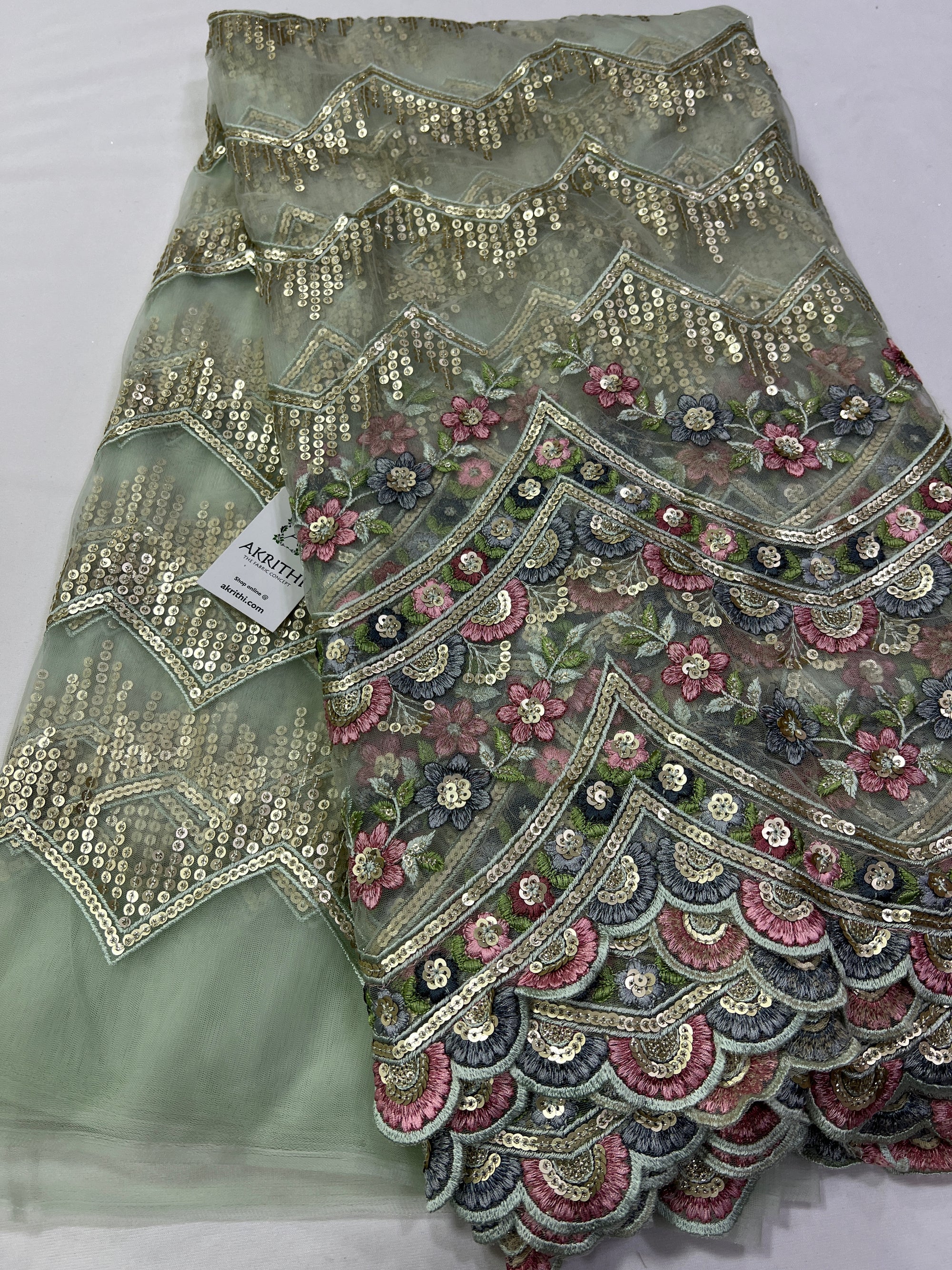 Embroidery on net fabric