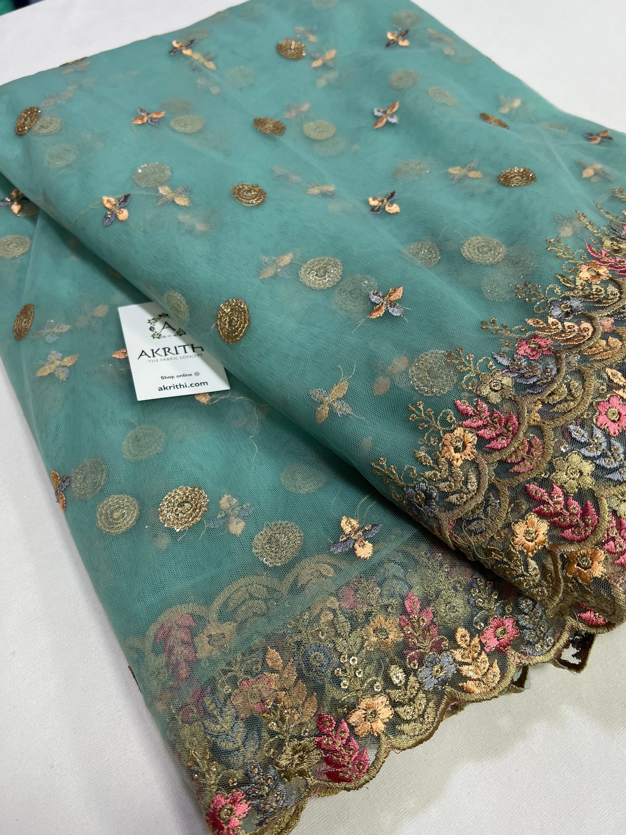 Embroidery on net fabric