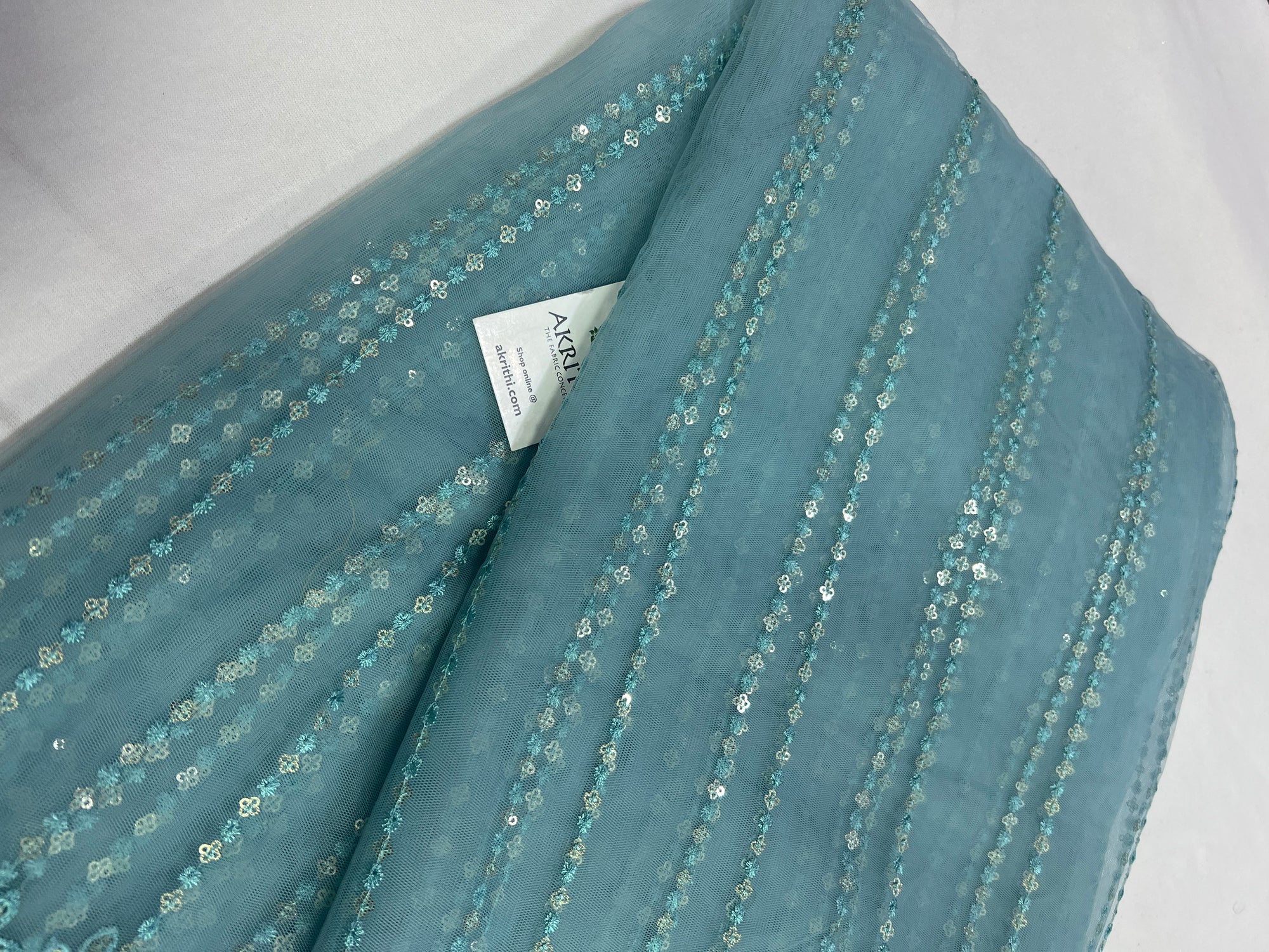 Embroidery on net fabric