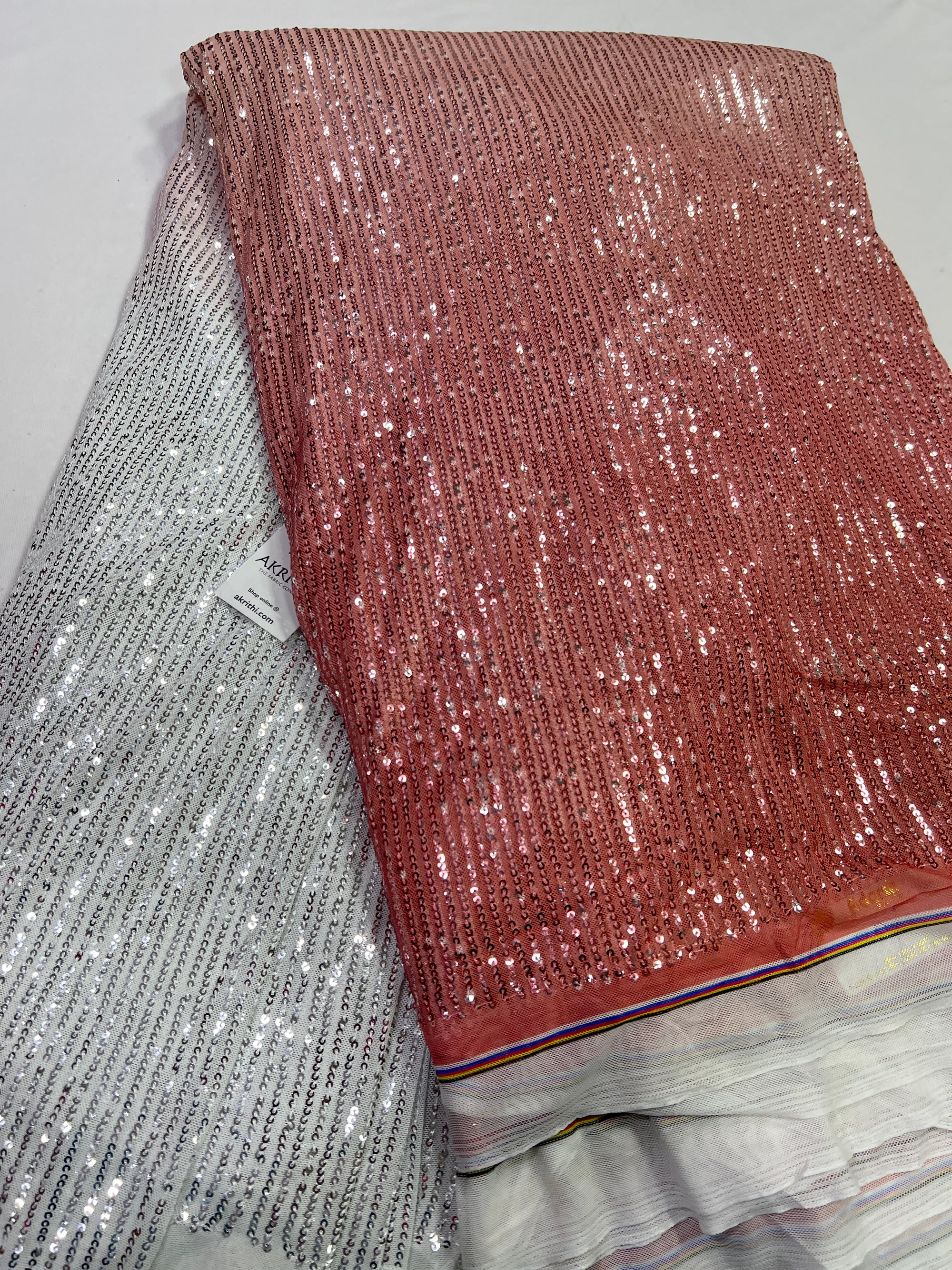 Sequins on shaded net fabric