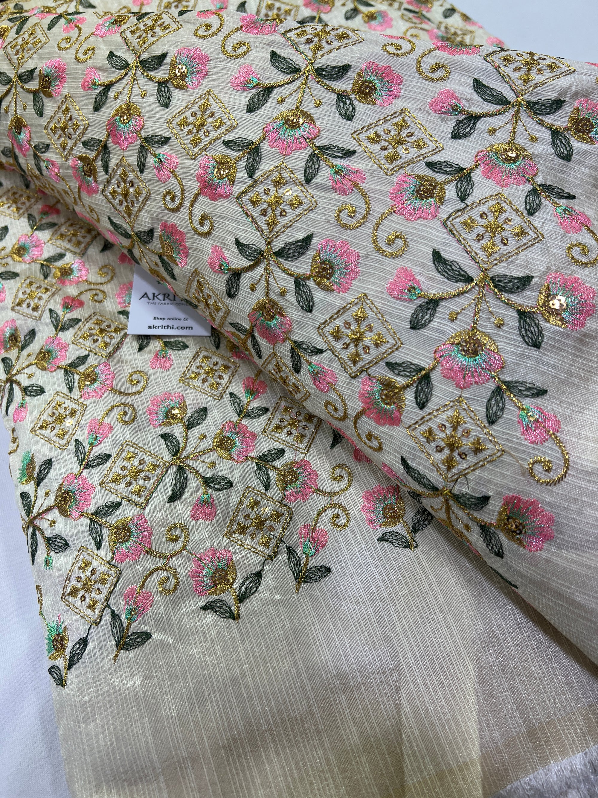 Embroidery on raw silk fabric