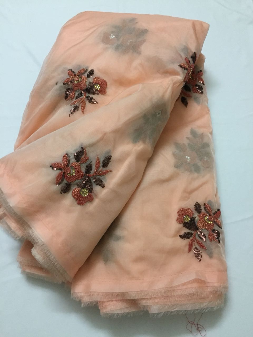 Embroidery on organza fabric