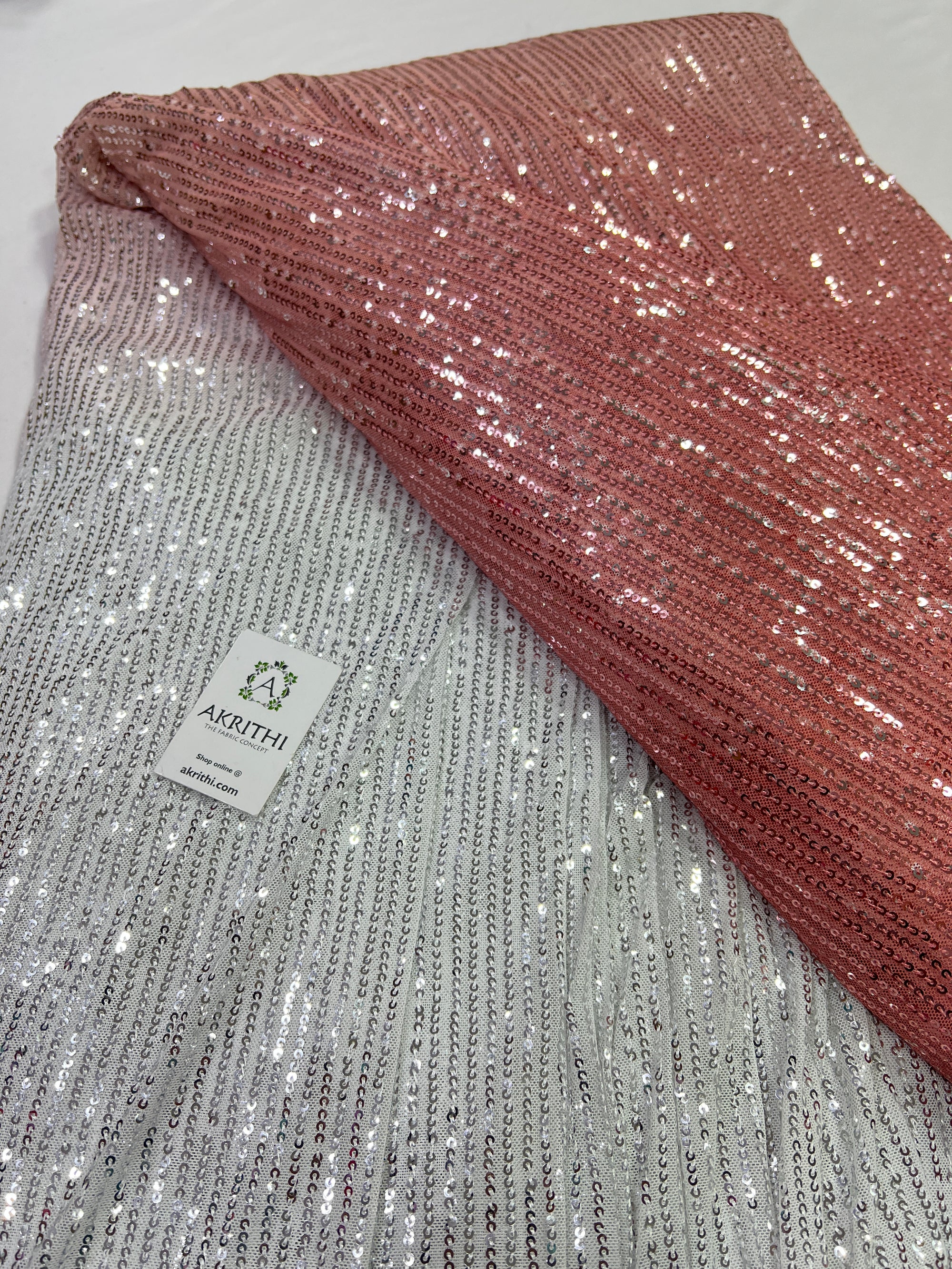 Sequins on shaded net fabric