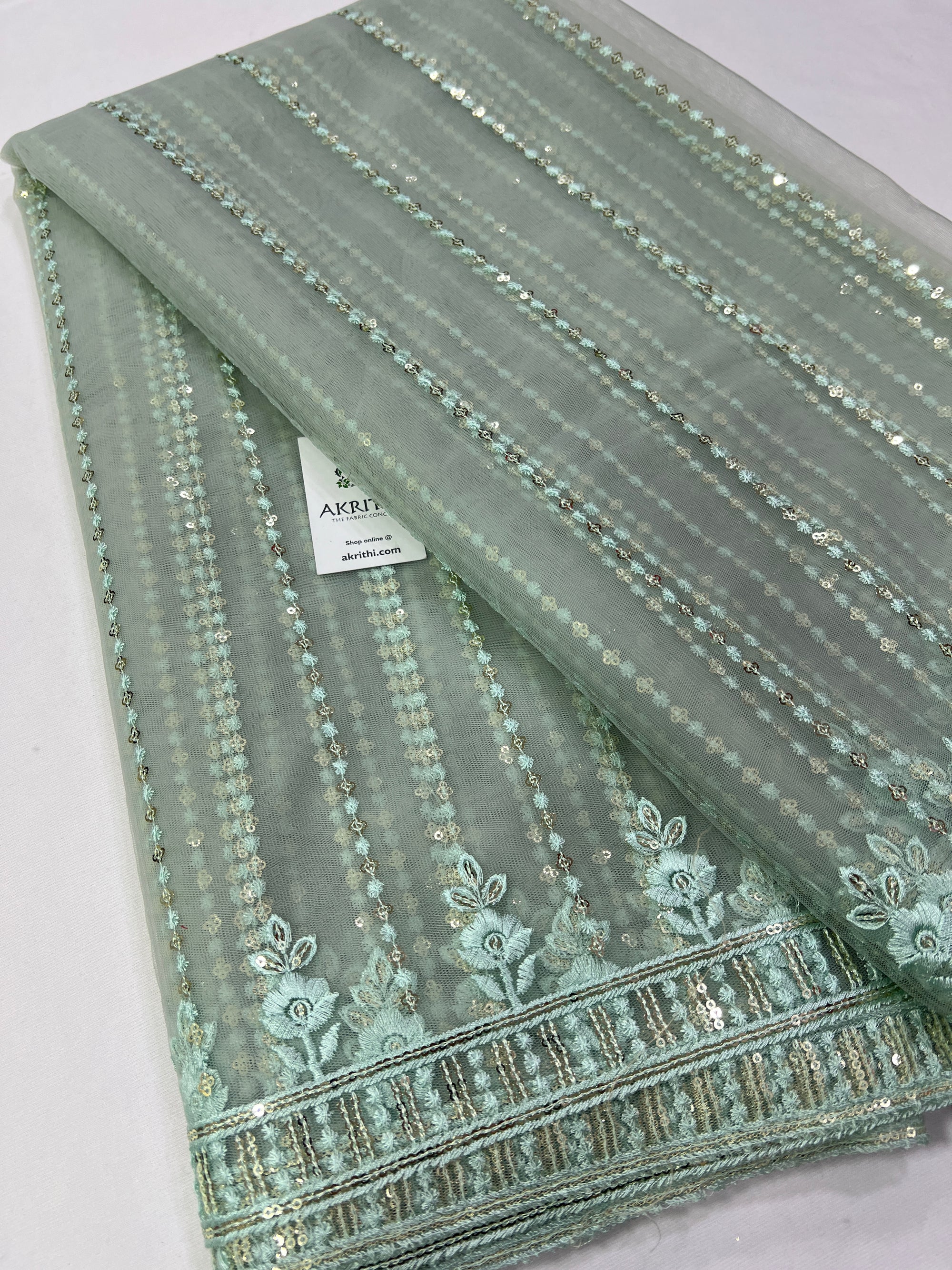 Embroidery on net fabric