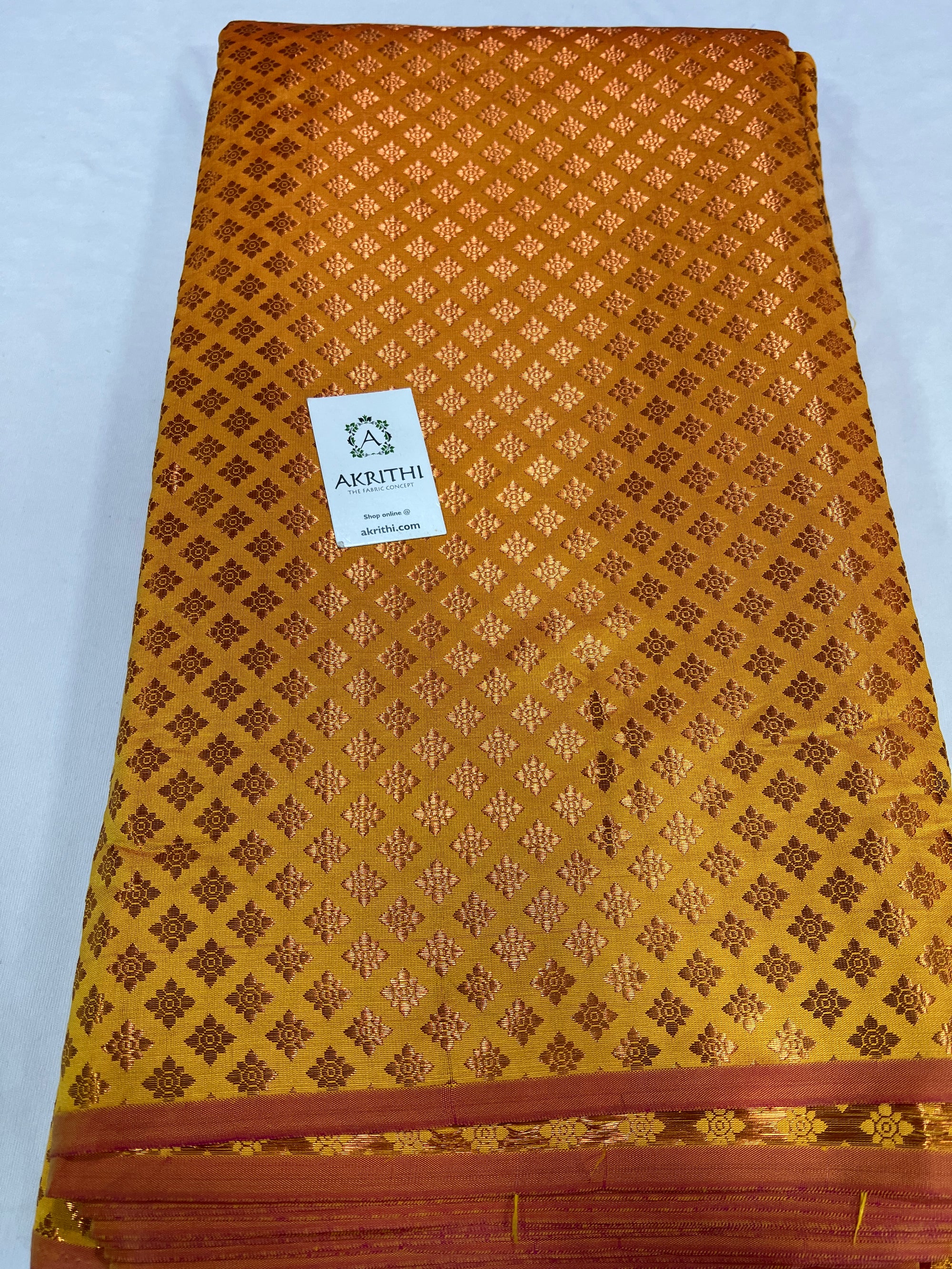 Banarasi brocade fabric with copper zari
