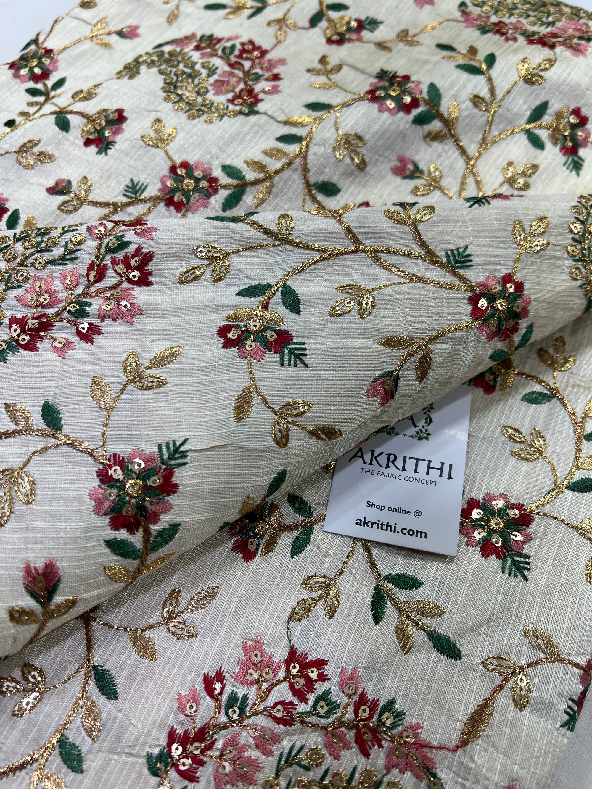Embroidery on raw silk fabric