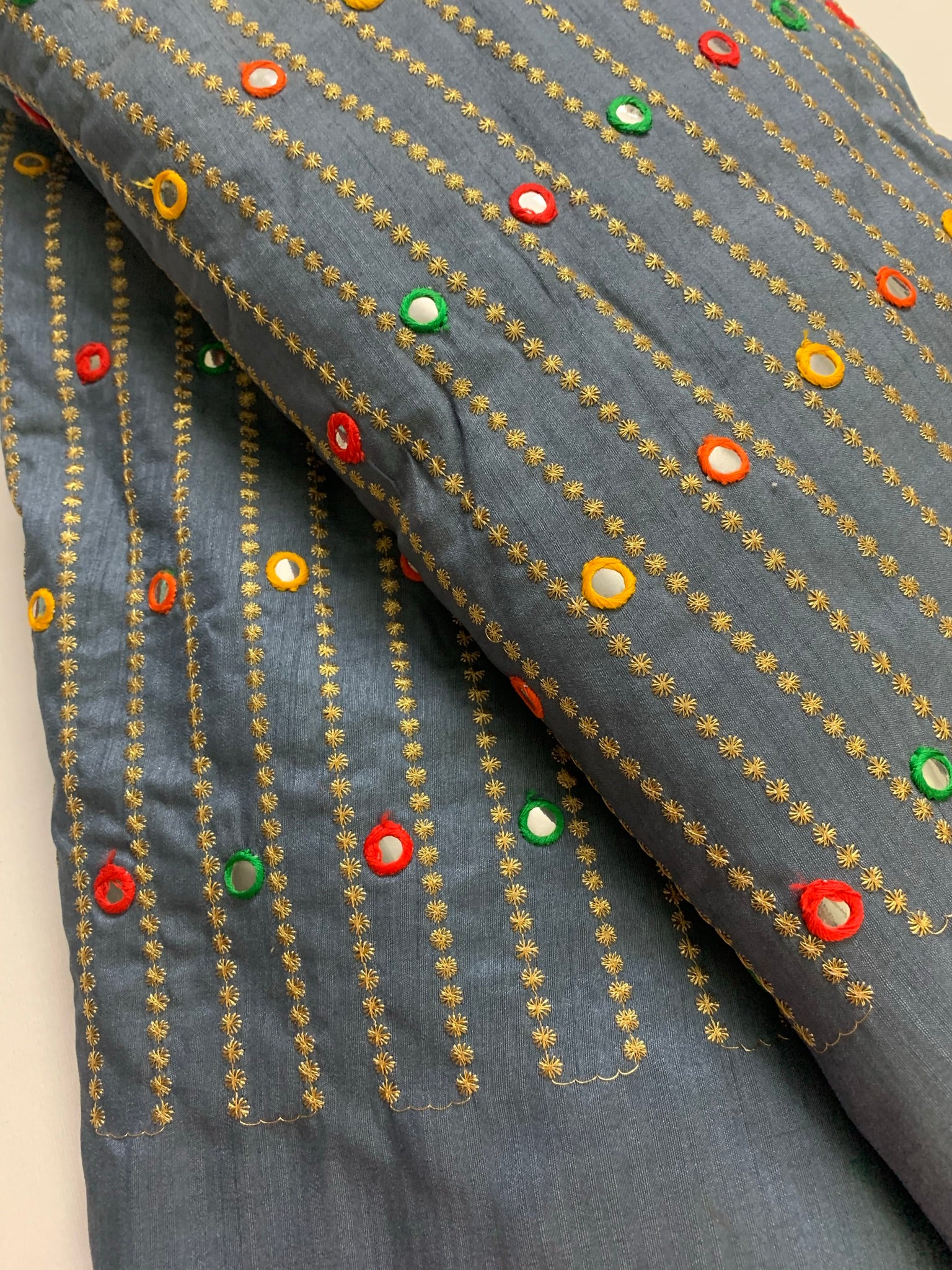 Embroidery on raw silk fabric