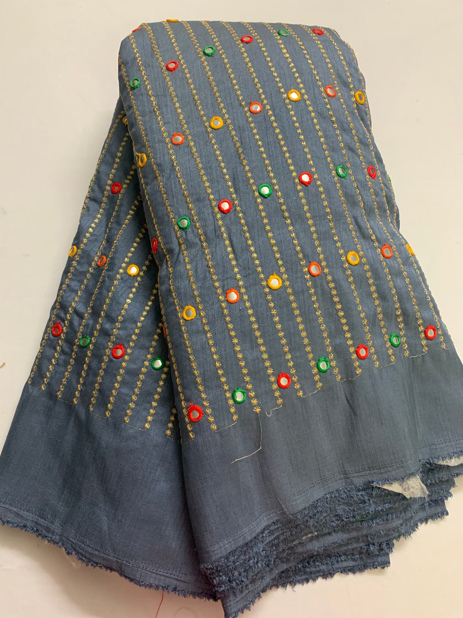 Embroidery on raw silk fabric