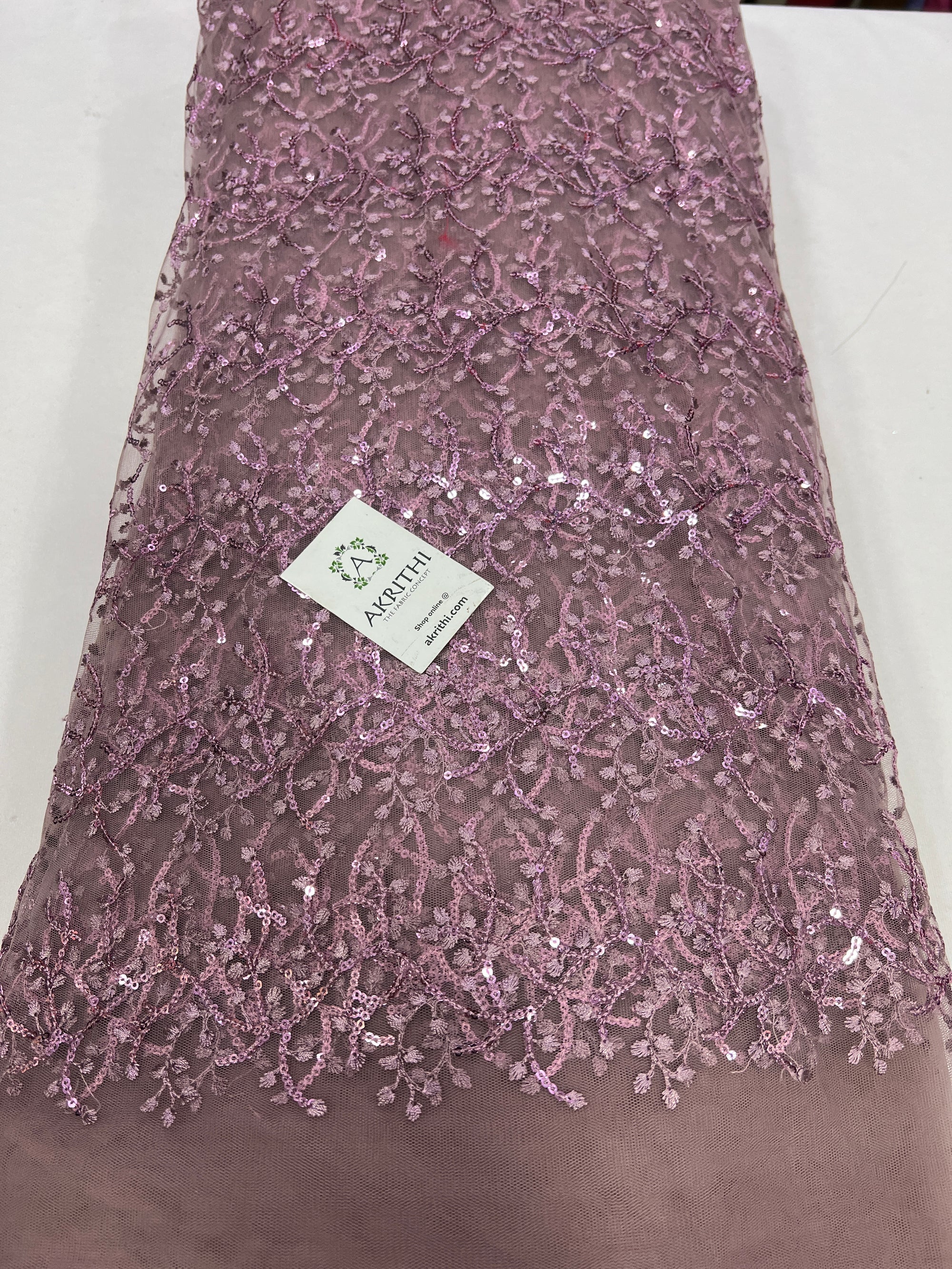 Embroidery on net fabric