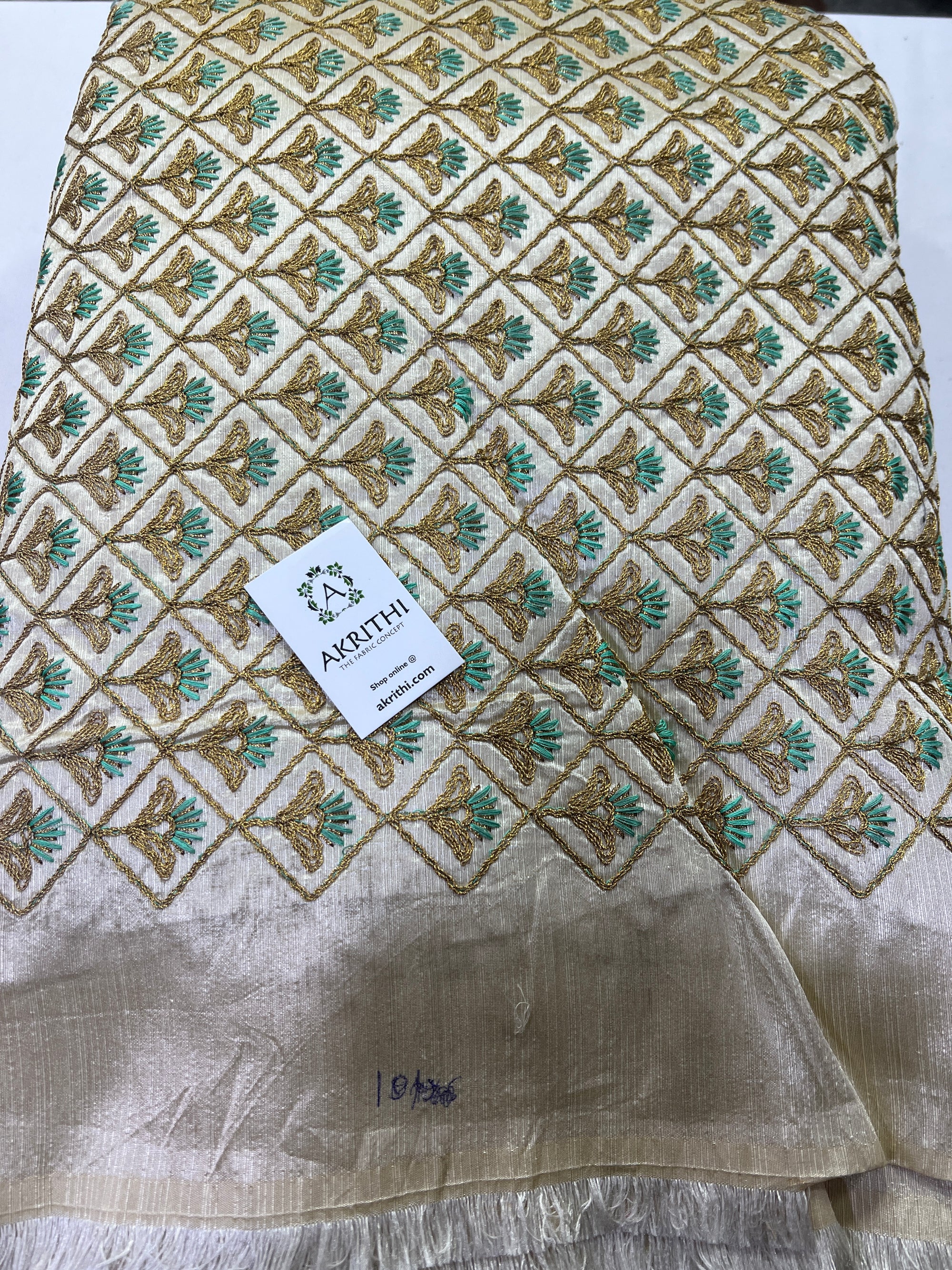 Embroidery on raw silk fabric