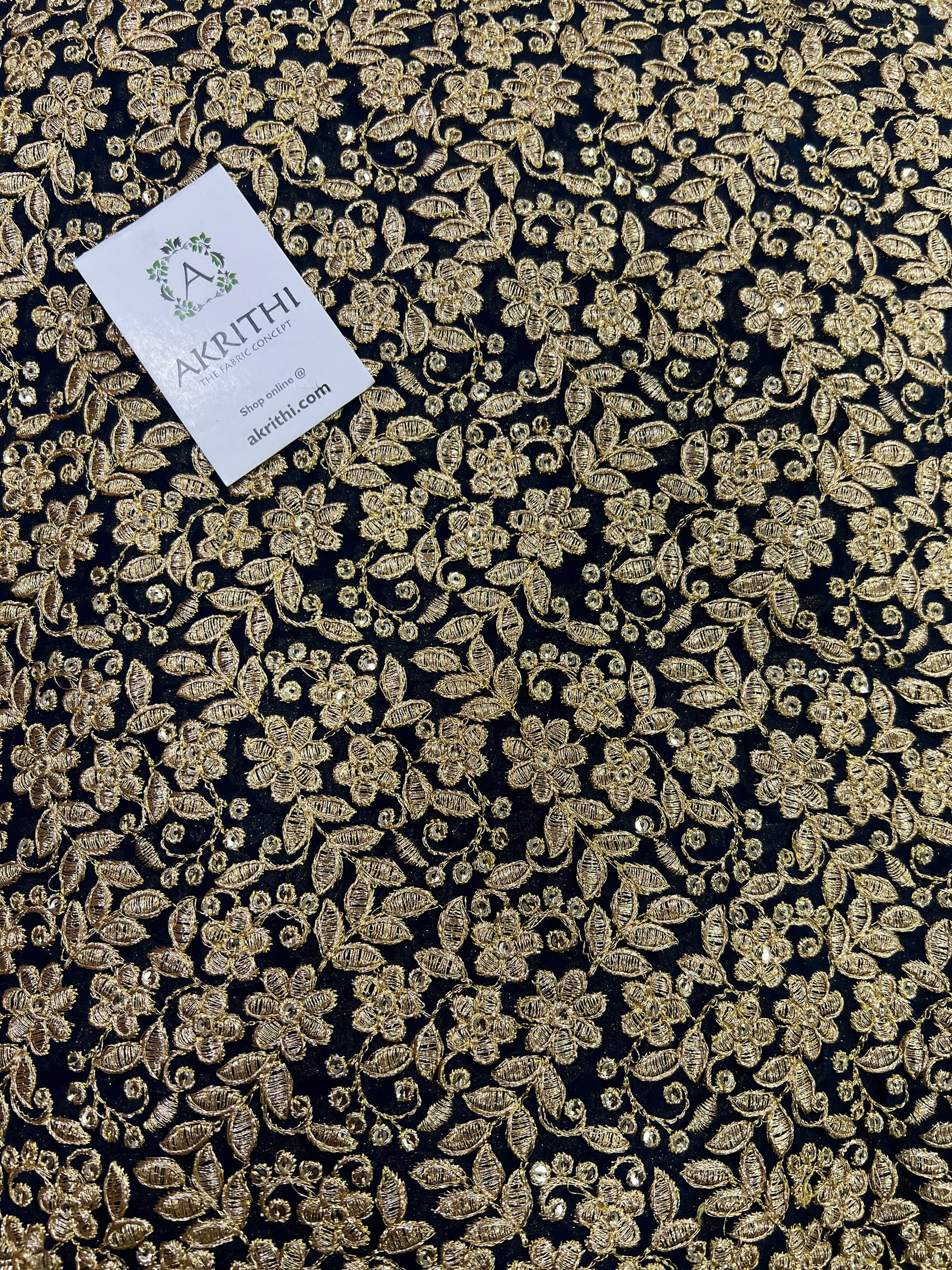 Embroidery on peacock blue georgette fabric