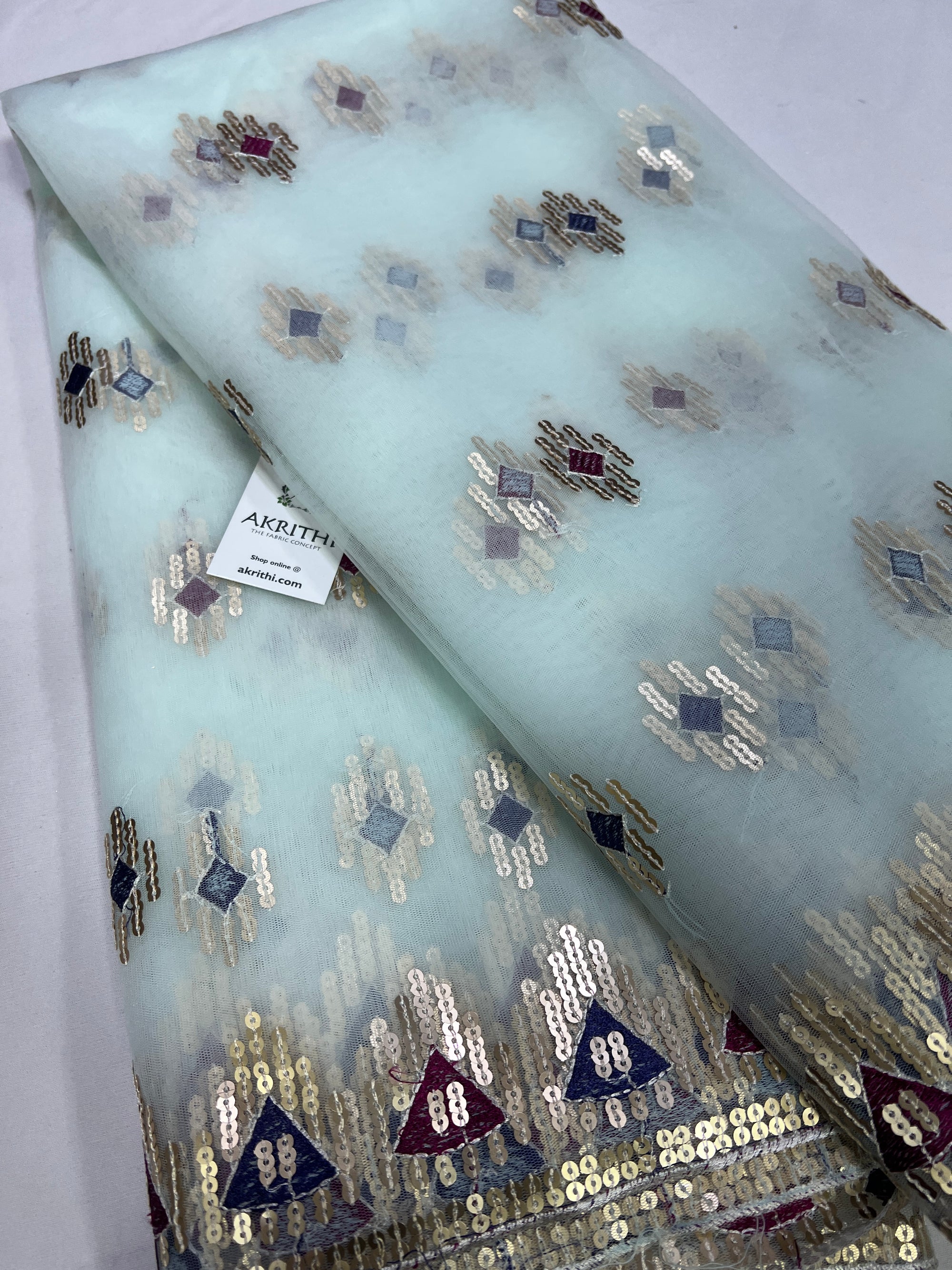 Embroidery on net fabric