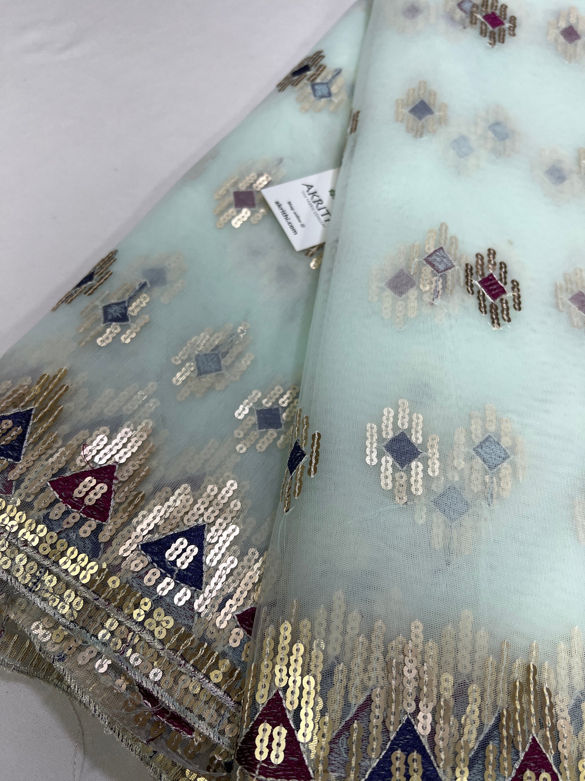 Embroidery on net fabric