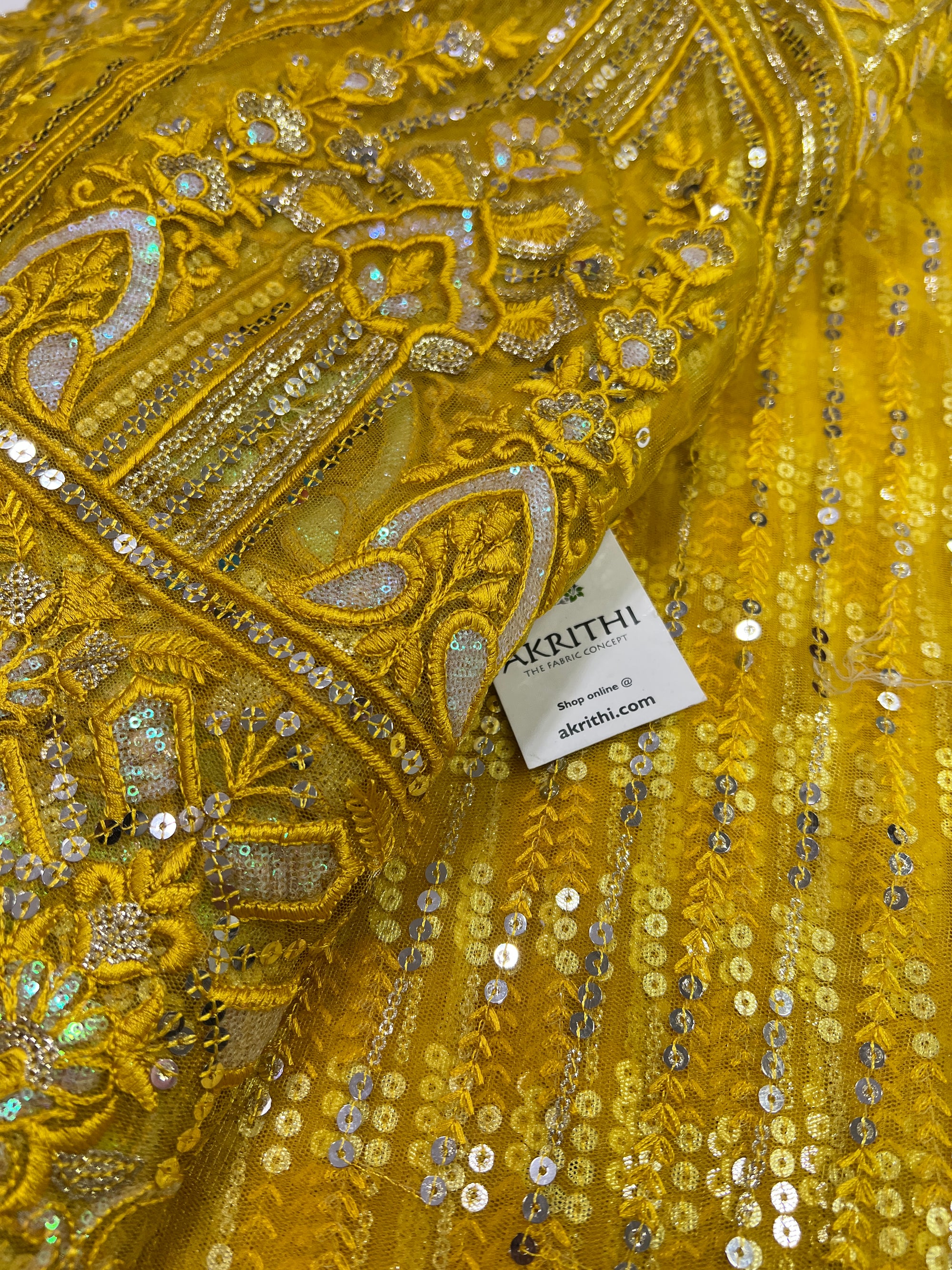 Embroidery on net fabric