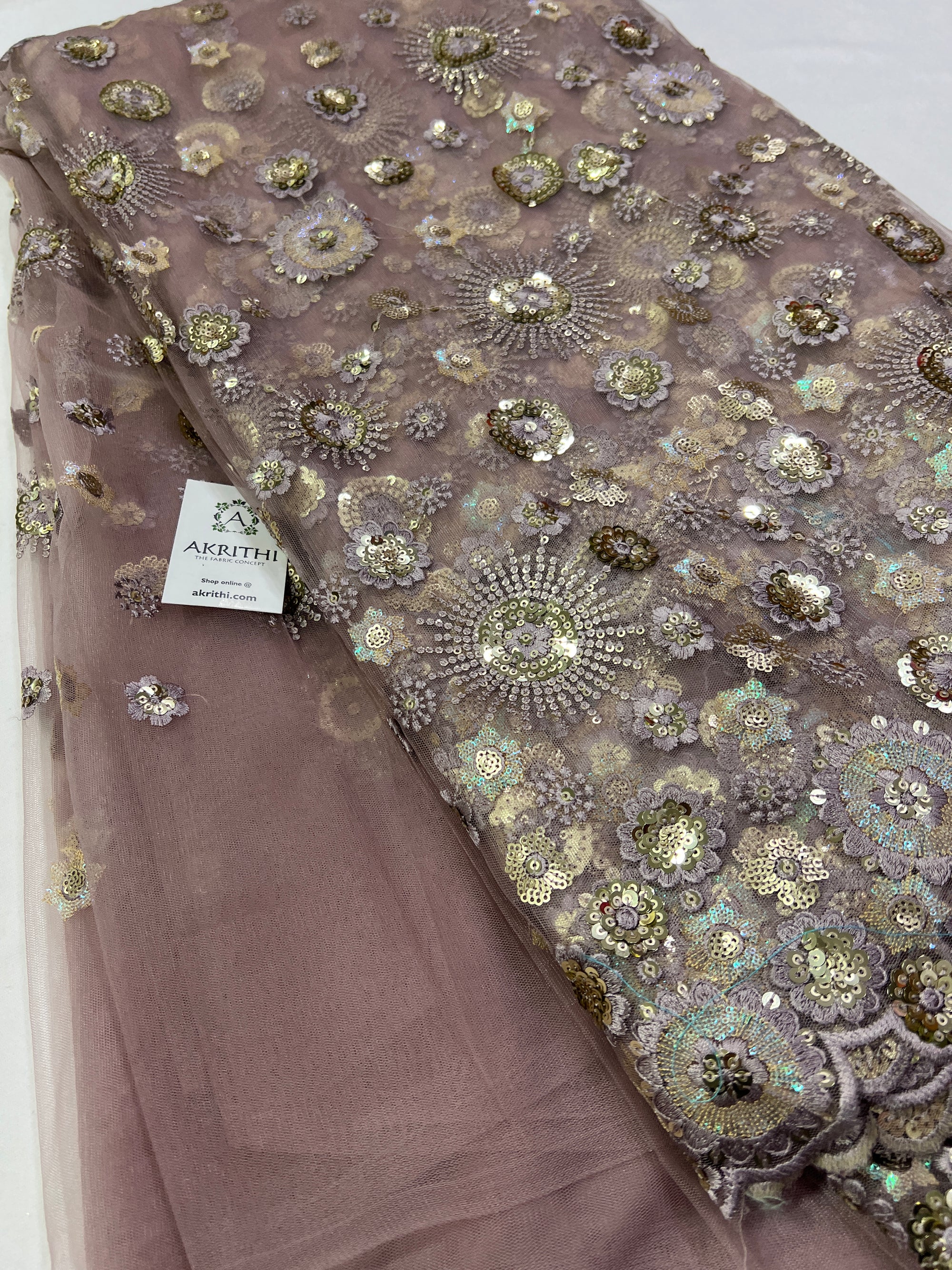 Embroidery on net fabric