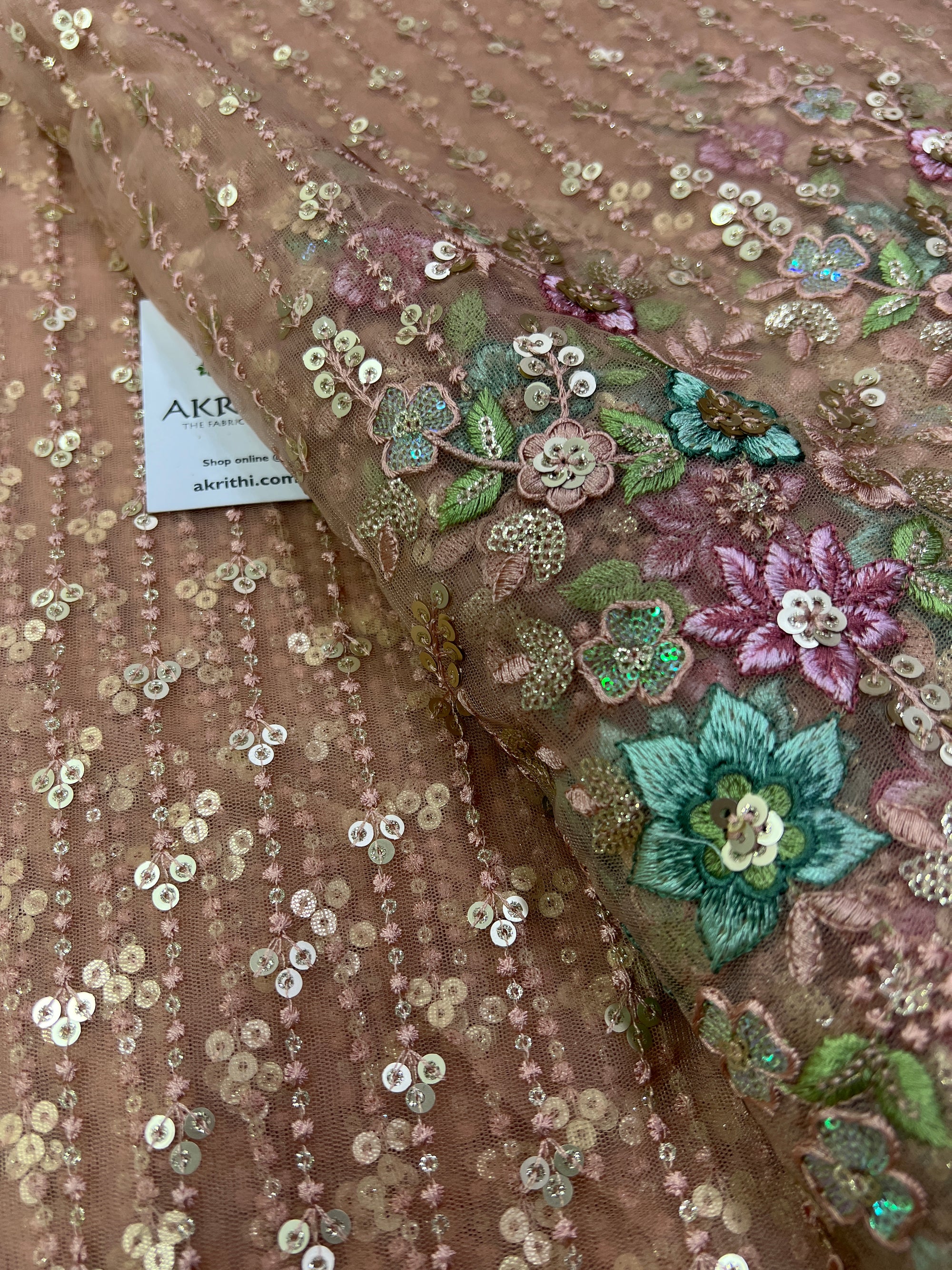 Embroidery on net fabric