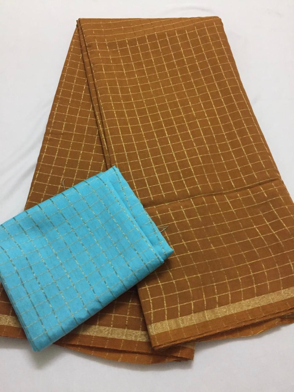 Silk zari checks saree with contrast blouse