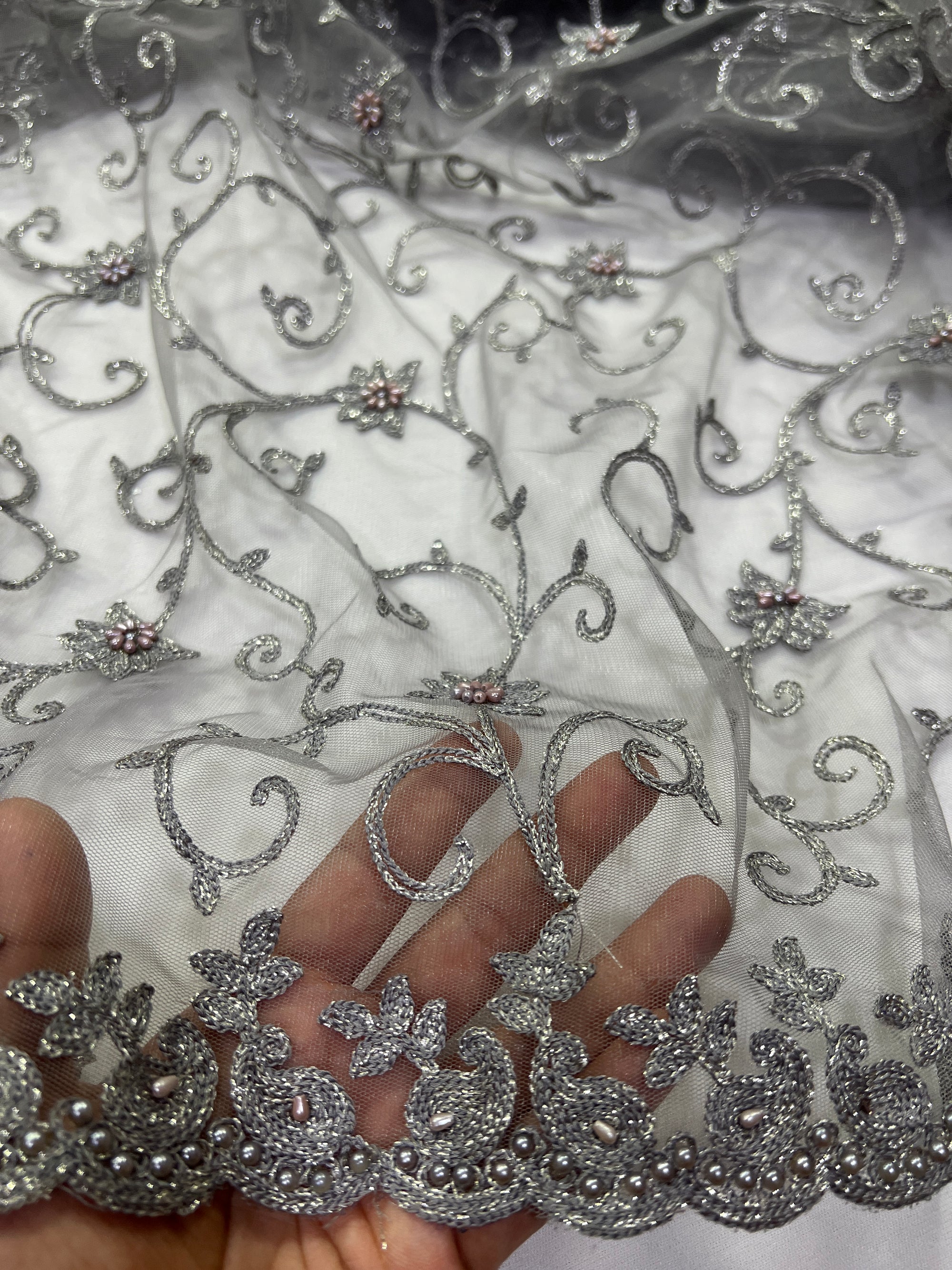 Embroidery on net fabric