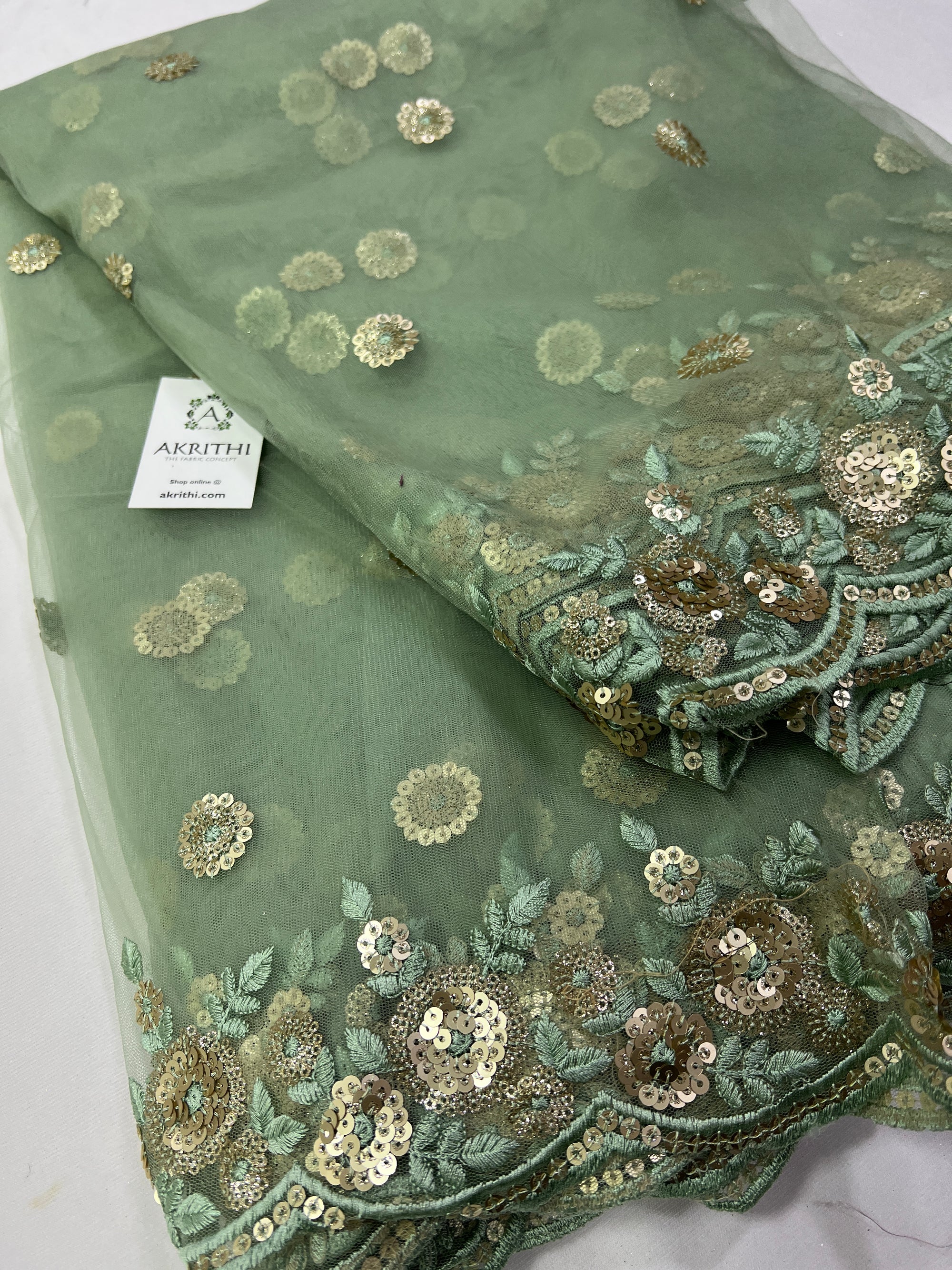 Embroidery on net fabric