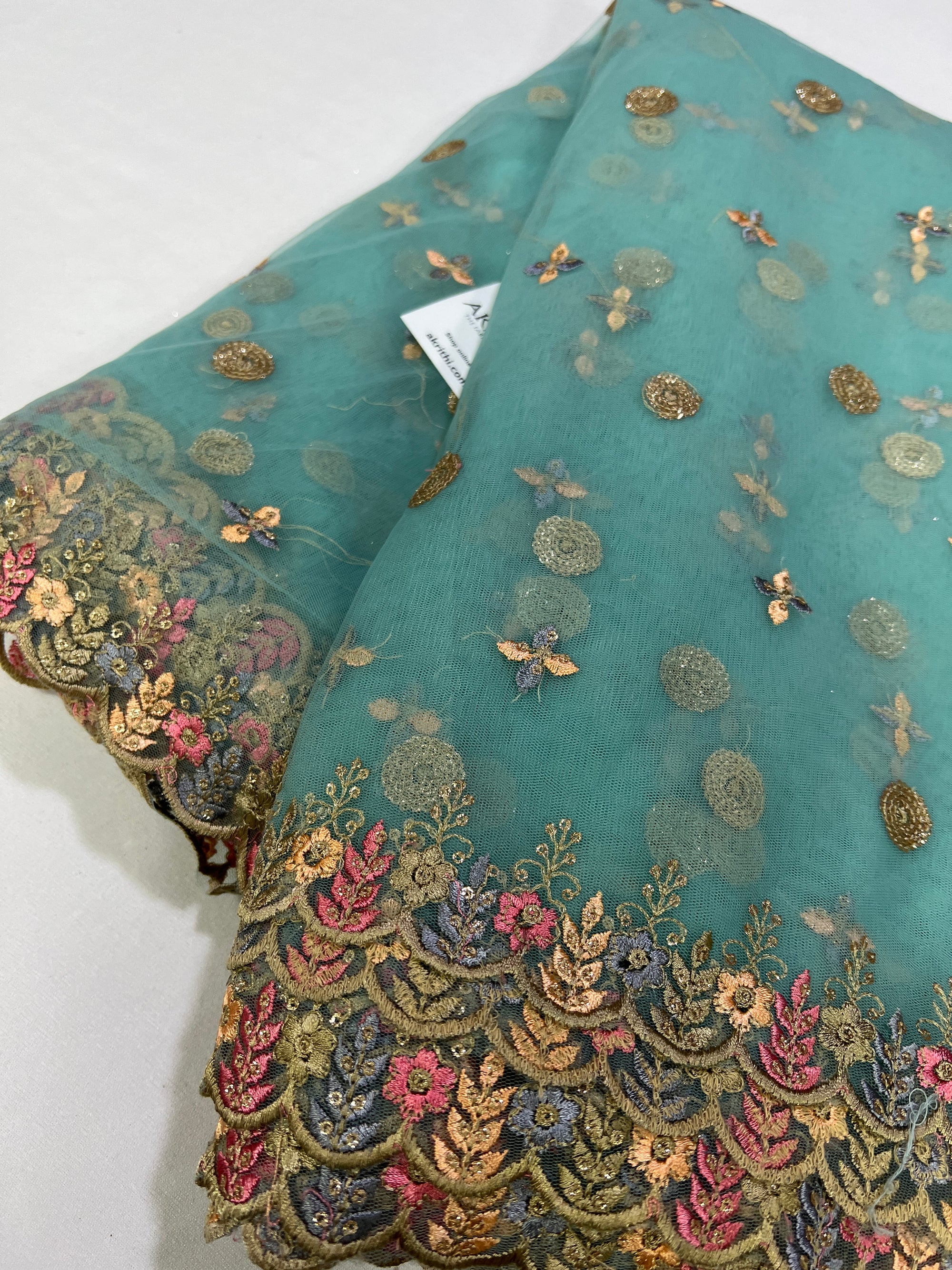 Embroidery on net fabric