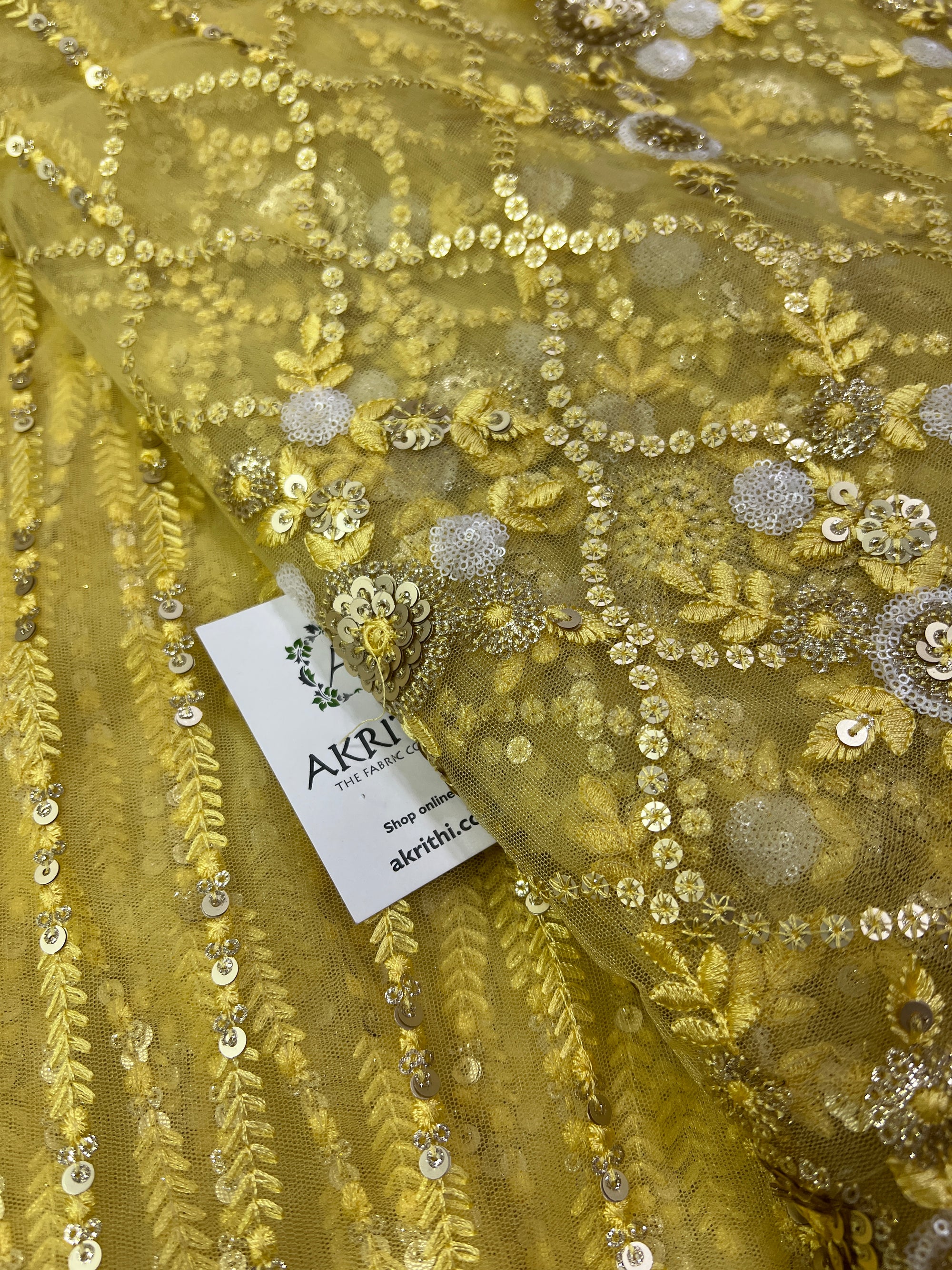 Embroidery on net fabric