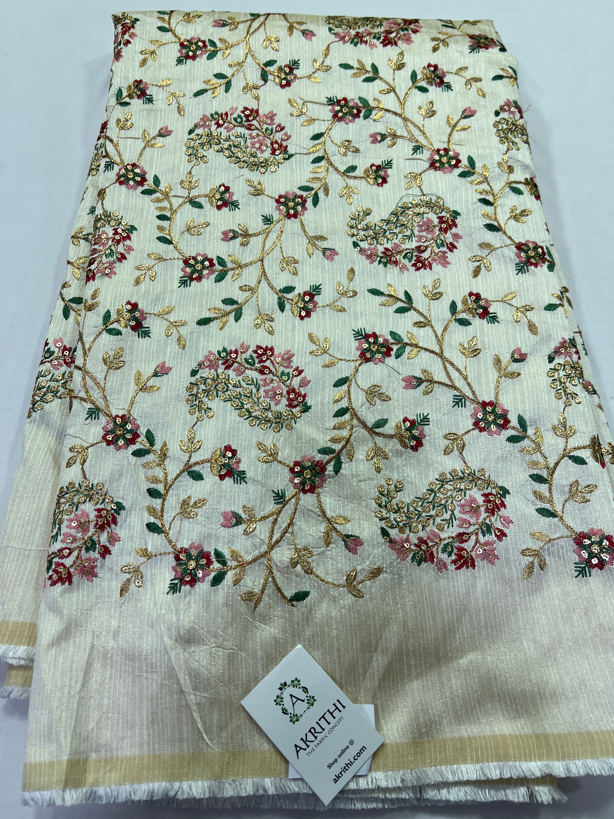 Embroidery on raw silk fabric