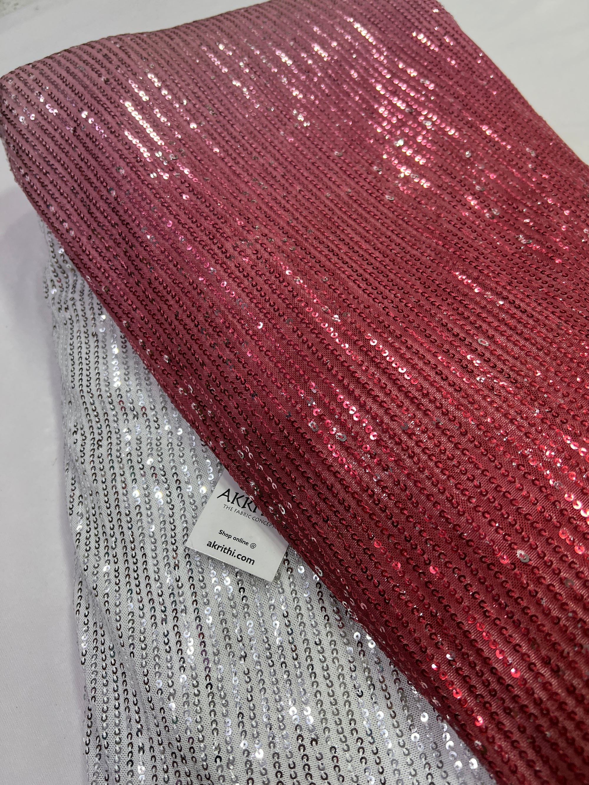 Sequins on shaded net fabric