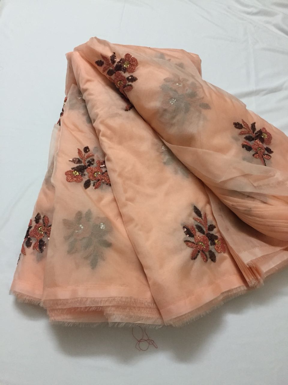 Embroidery on organza fabric