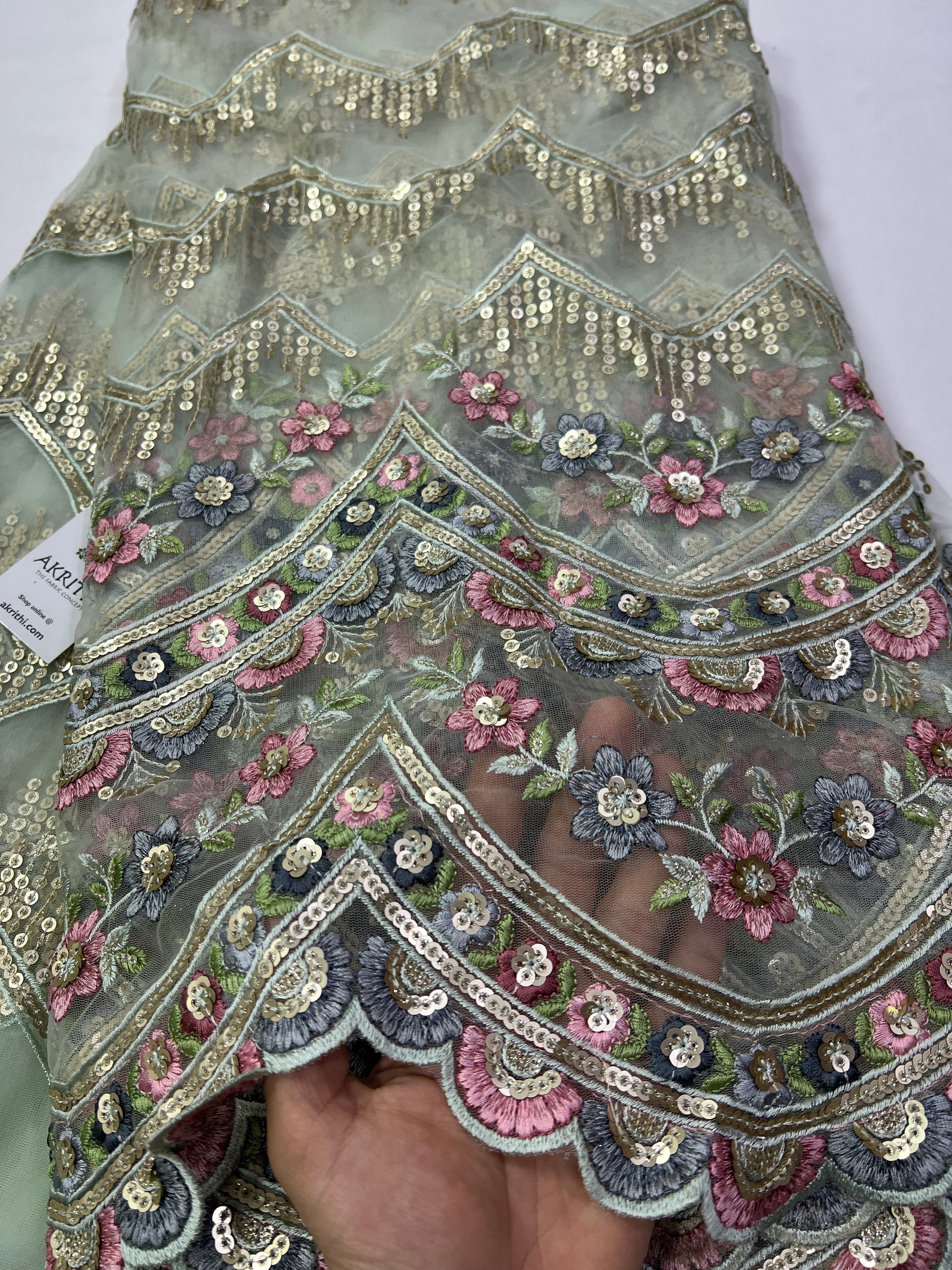 Embroidery on net fabric