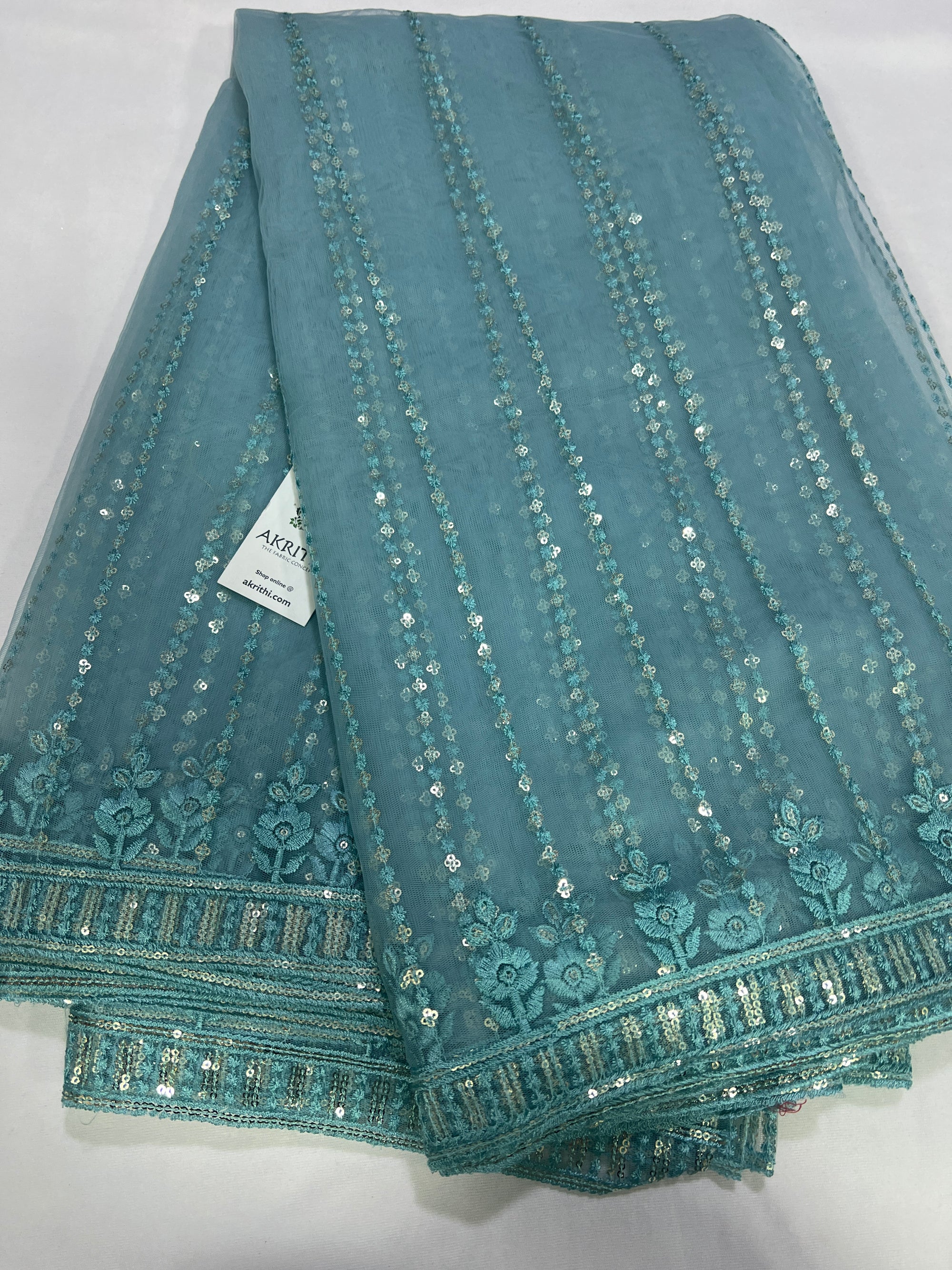 Embroidery on net fabric