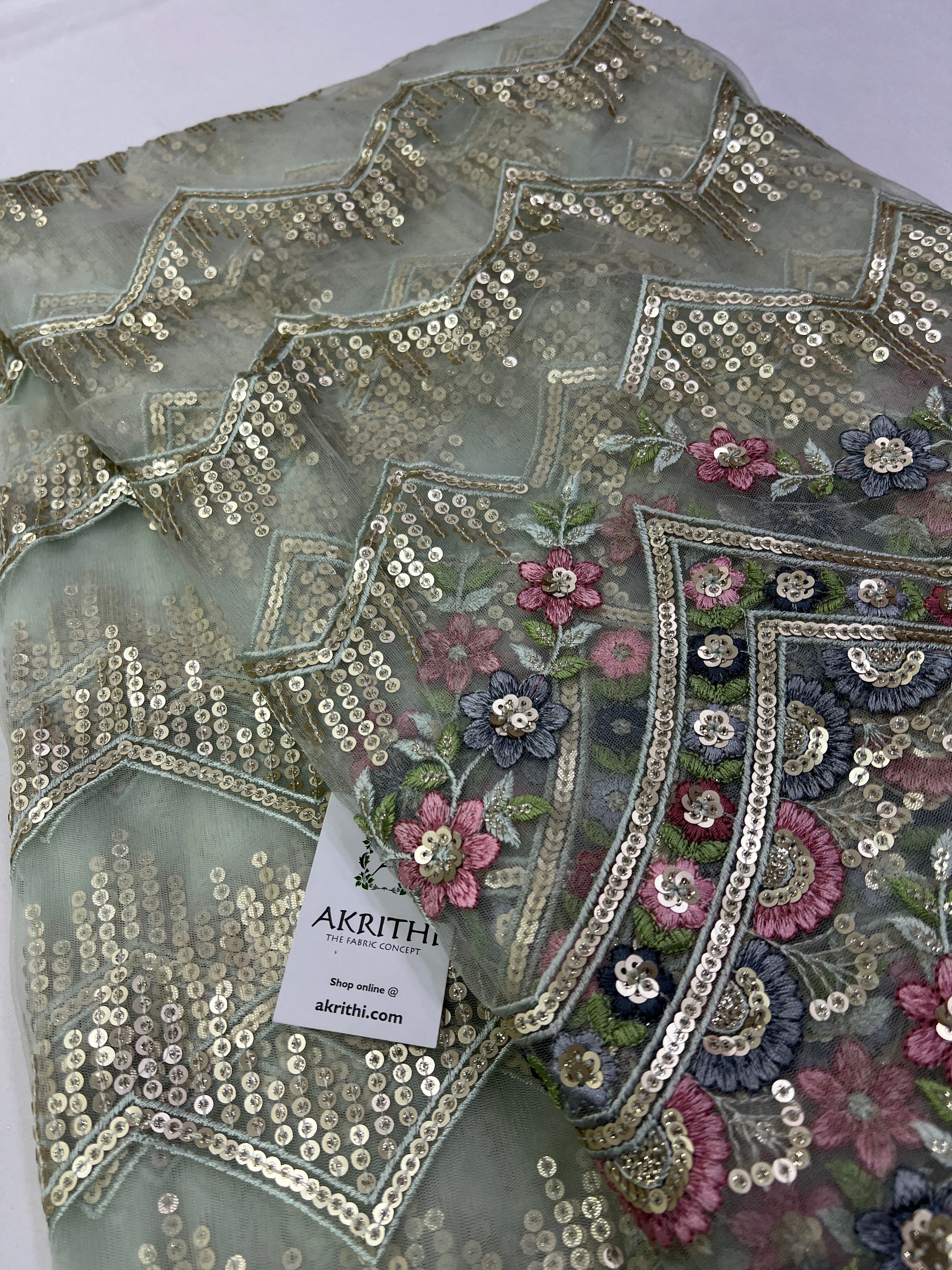 Embroidery on net fabric