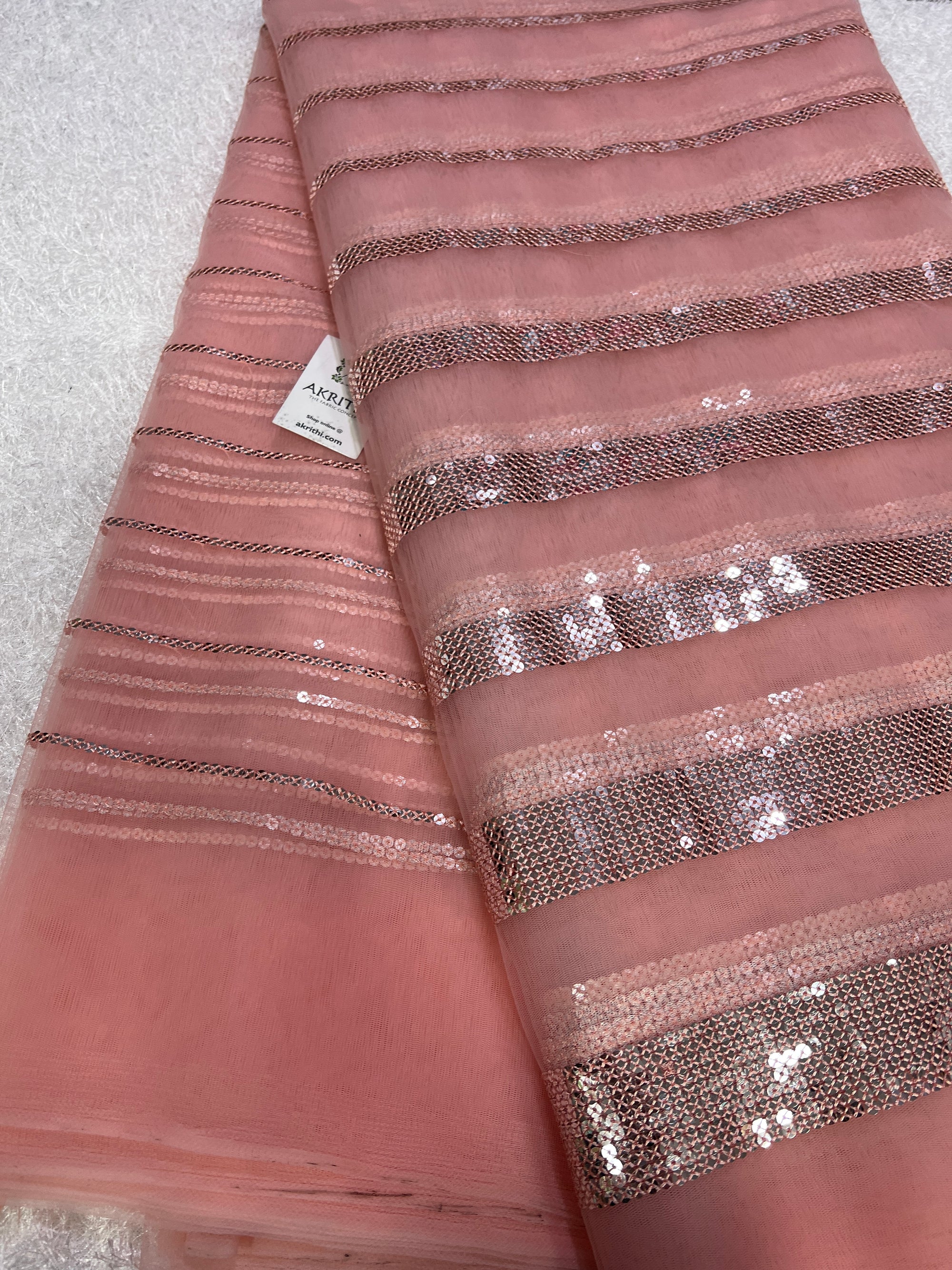 Embroidery on net fabric