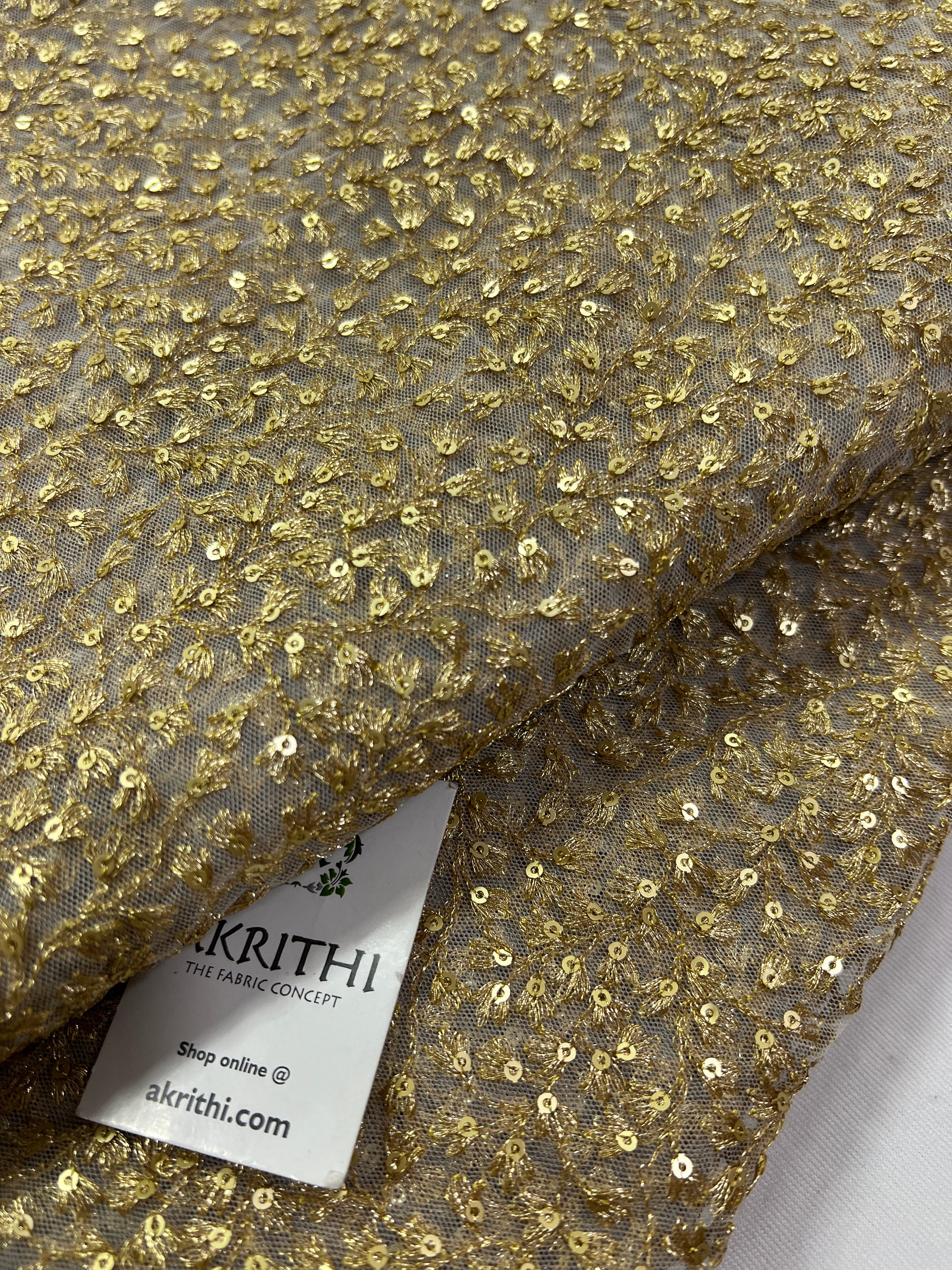 Gold Zari Embroidery on white net fabric