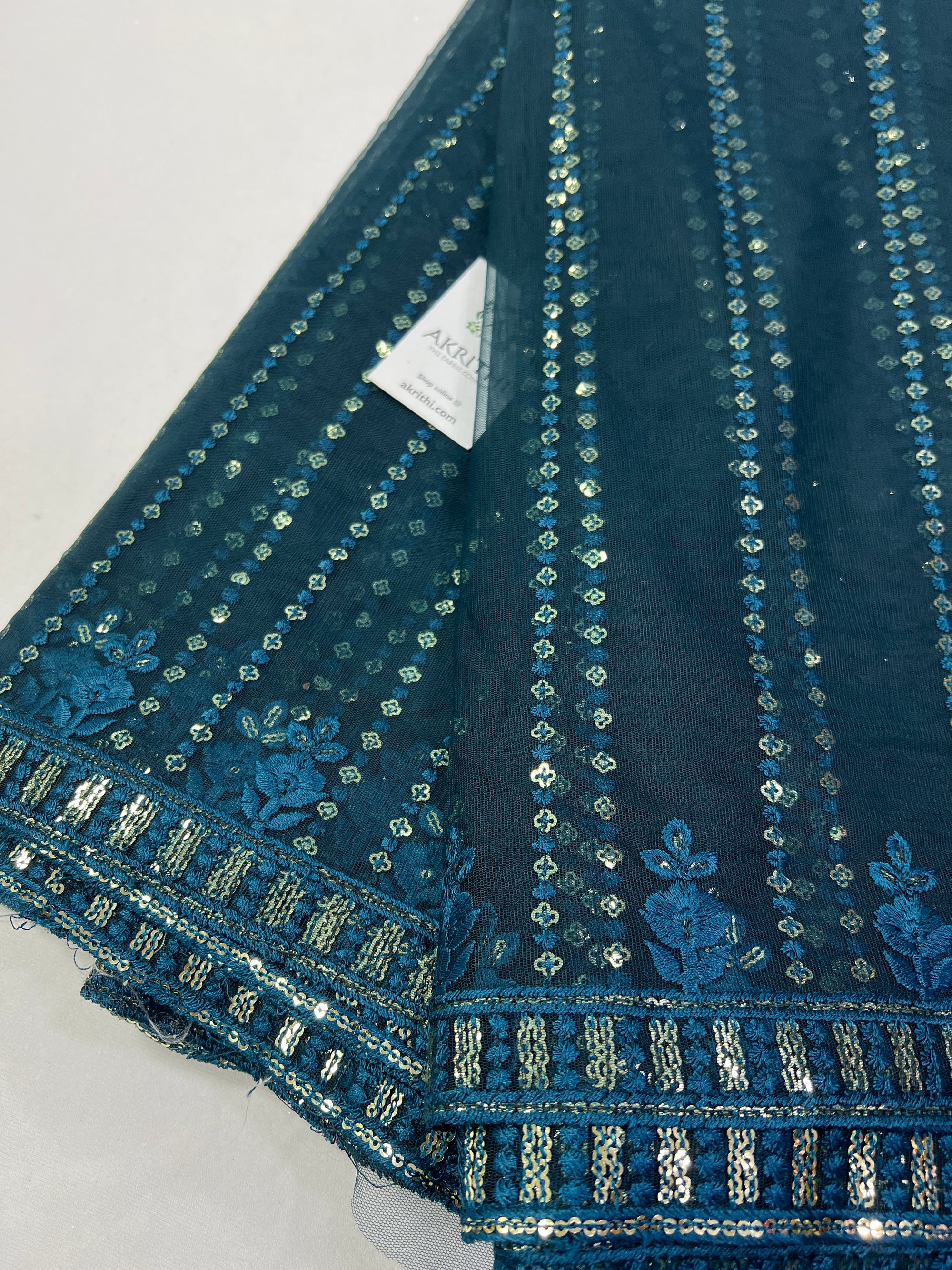 Embroidery on net fabric