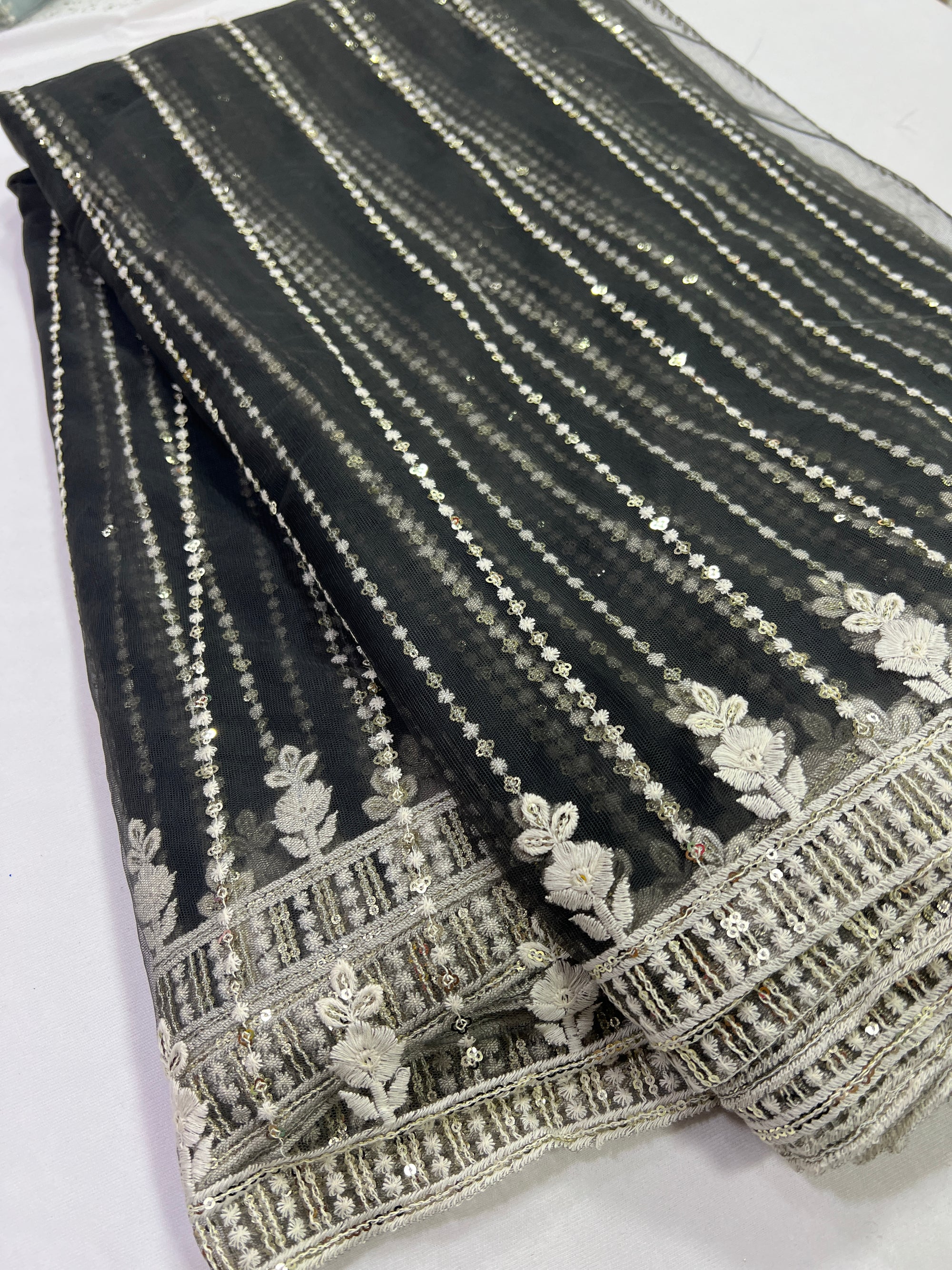 Embroidery on net fabric