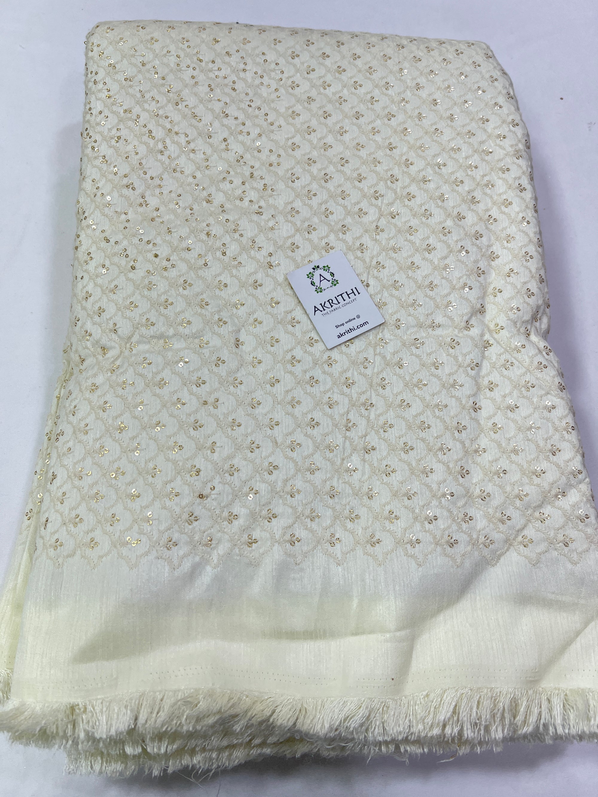 Embroidery on raw silk fabric
