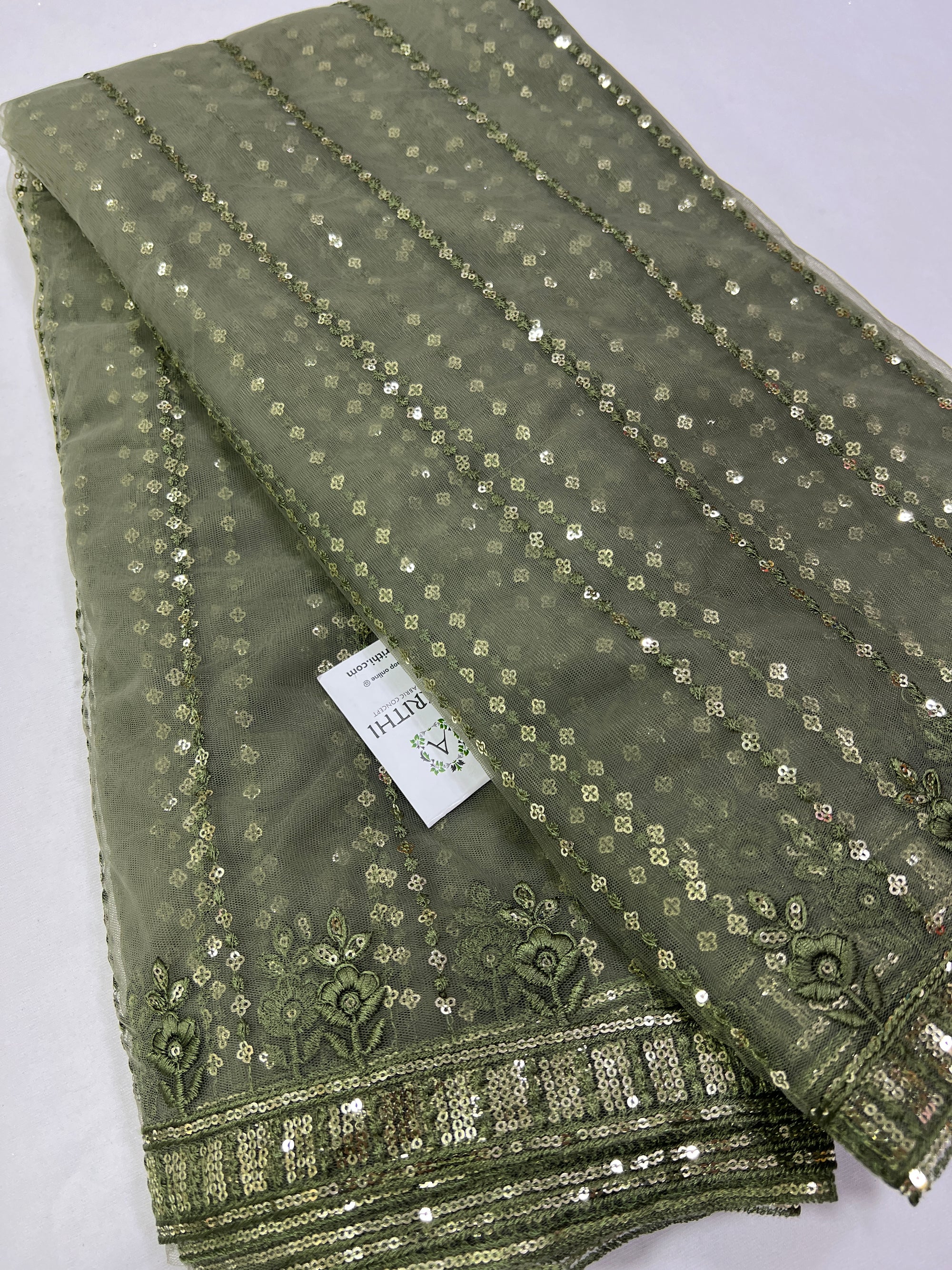 Embroidery on net fabric