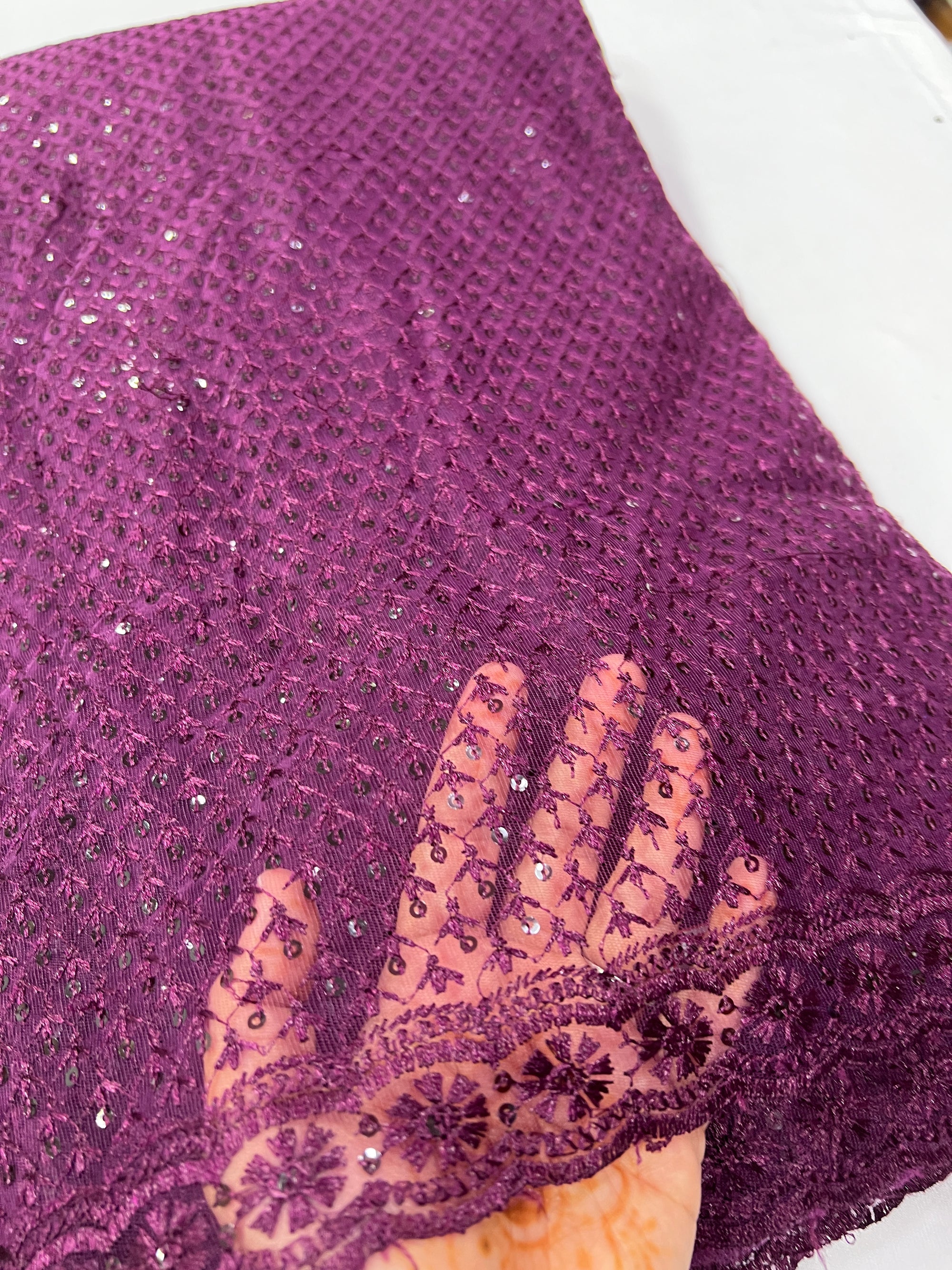Embroidery on net fabric