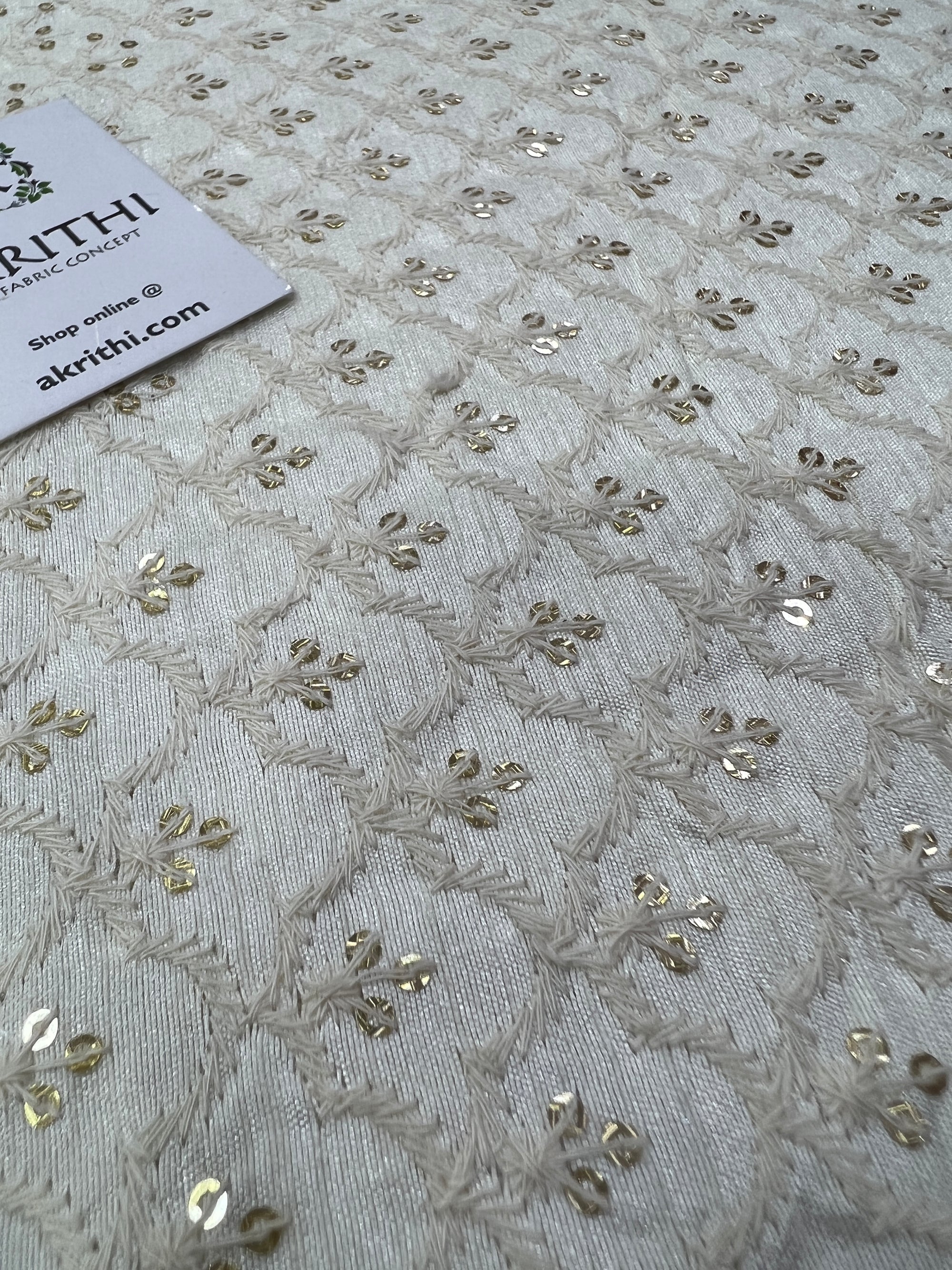 Embroidery on raw silk fabric