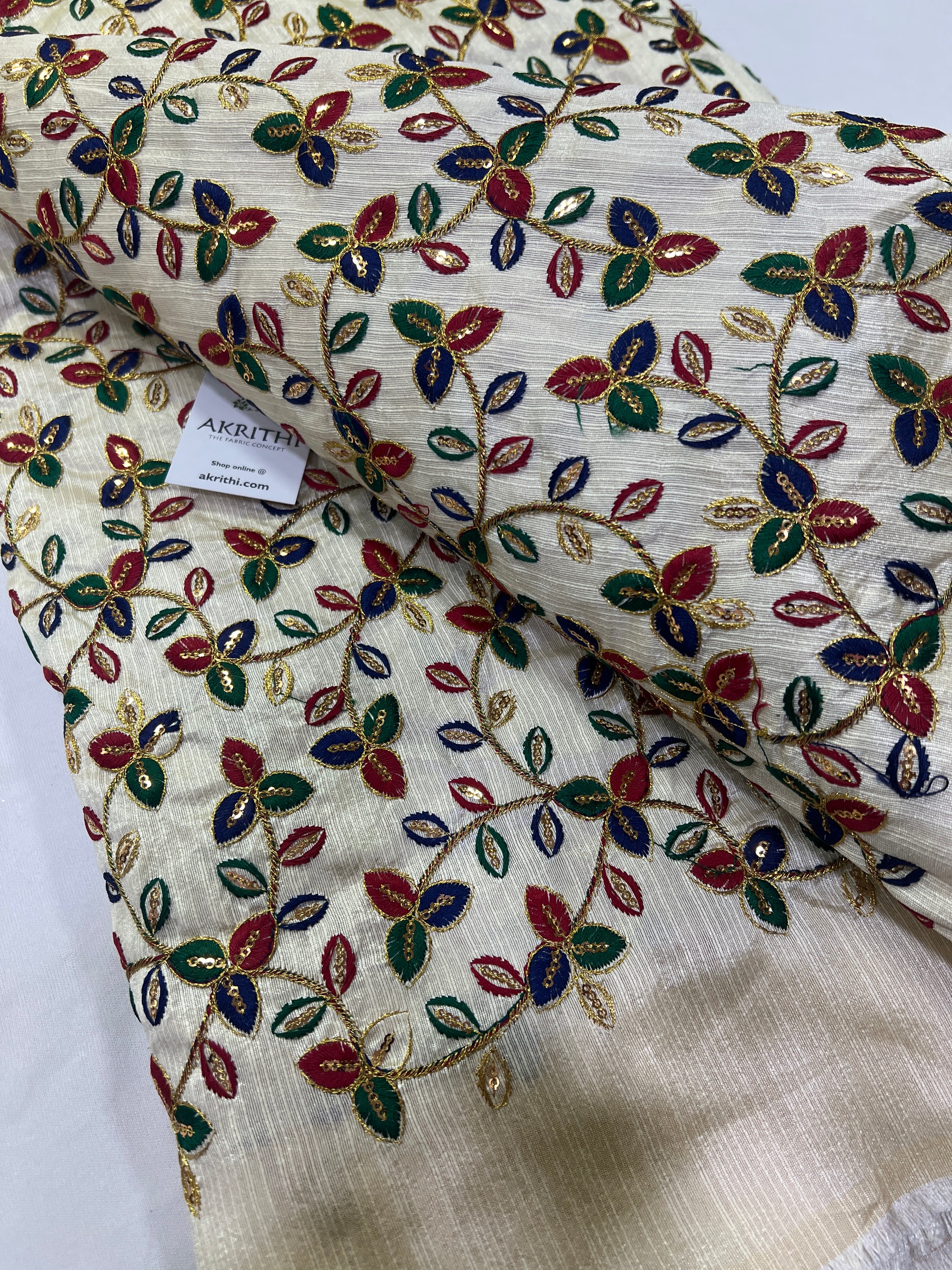 Embroidery on raw silk fabric
