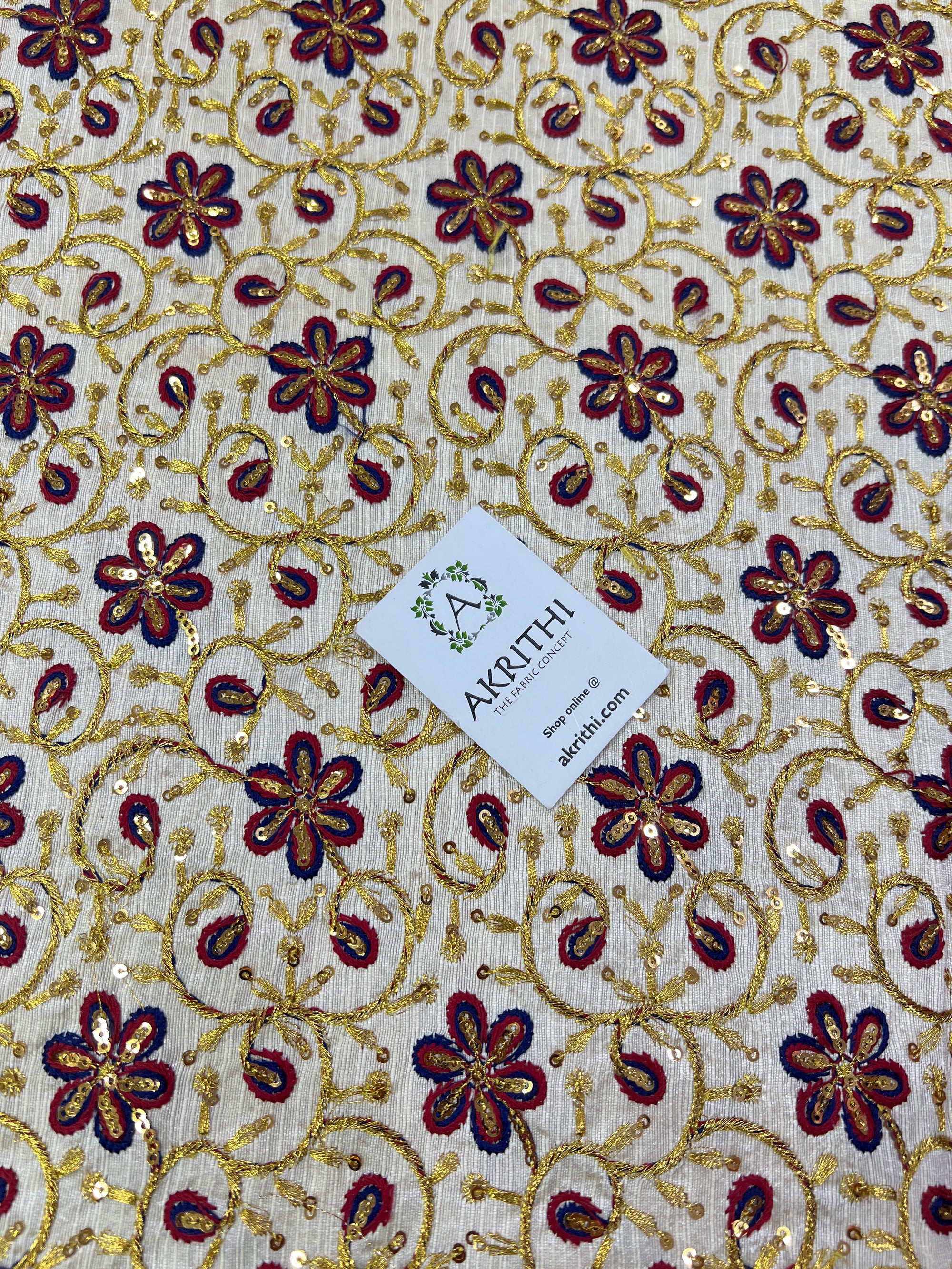 Embroidery on raw silk fabric
