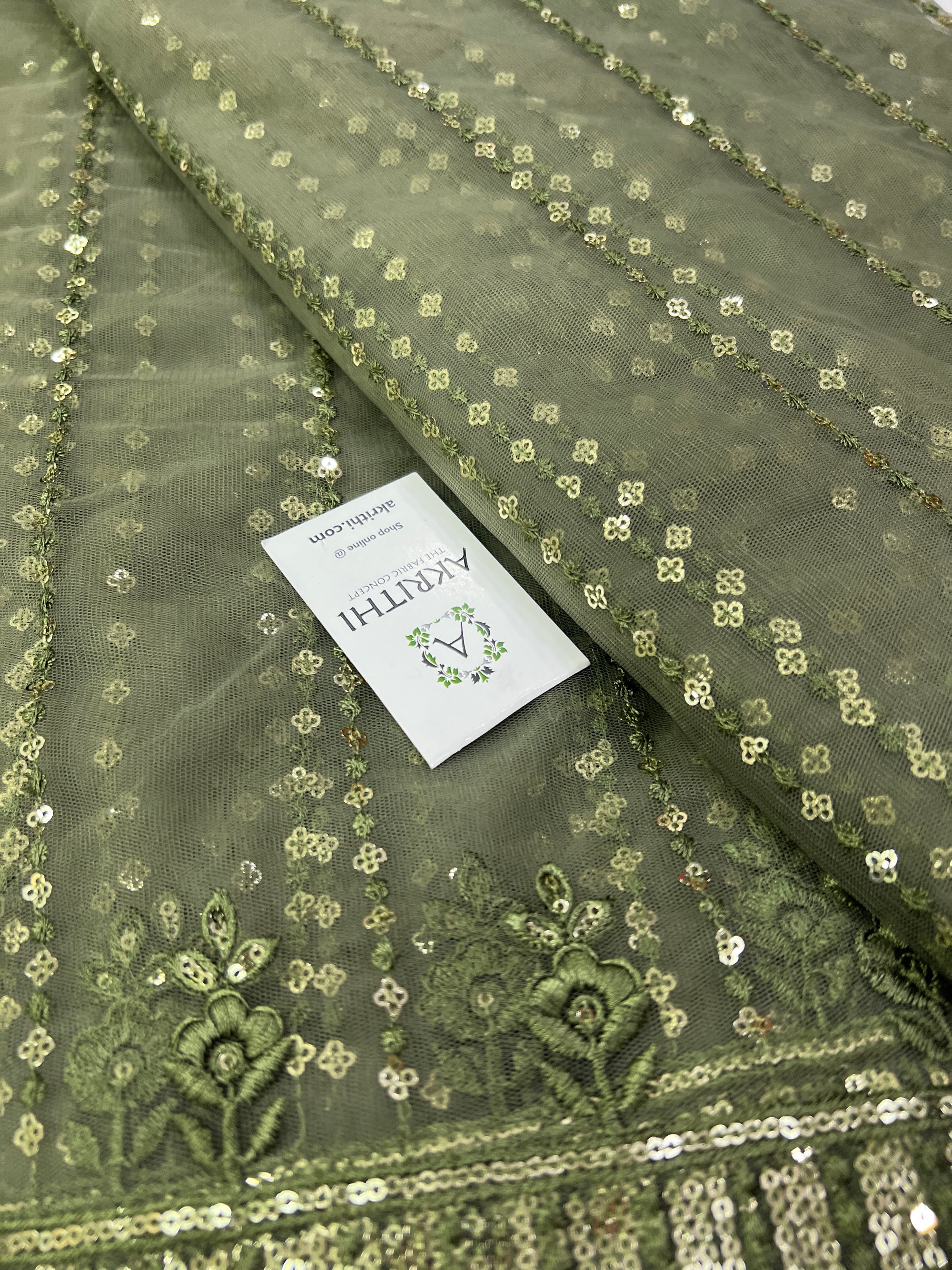 Embroidery on net fabric