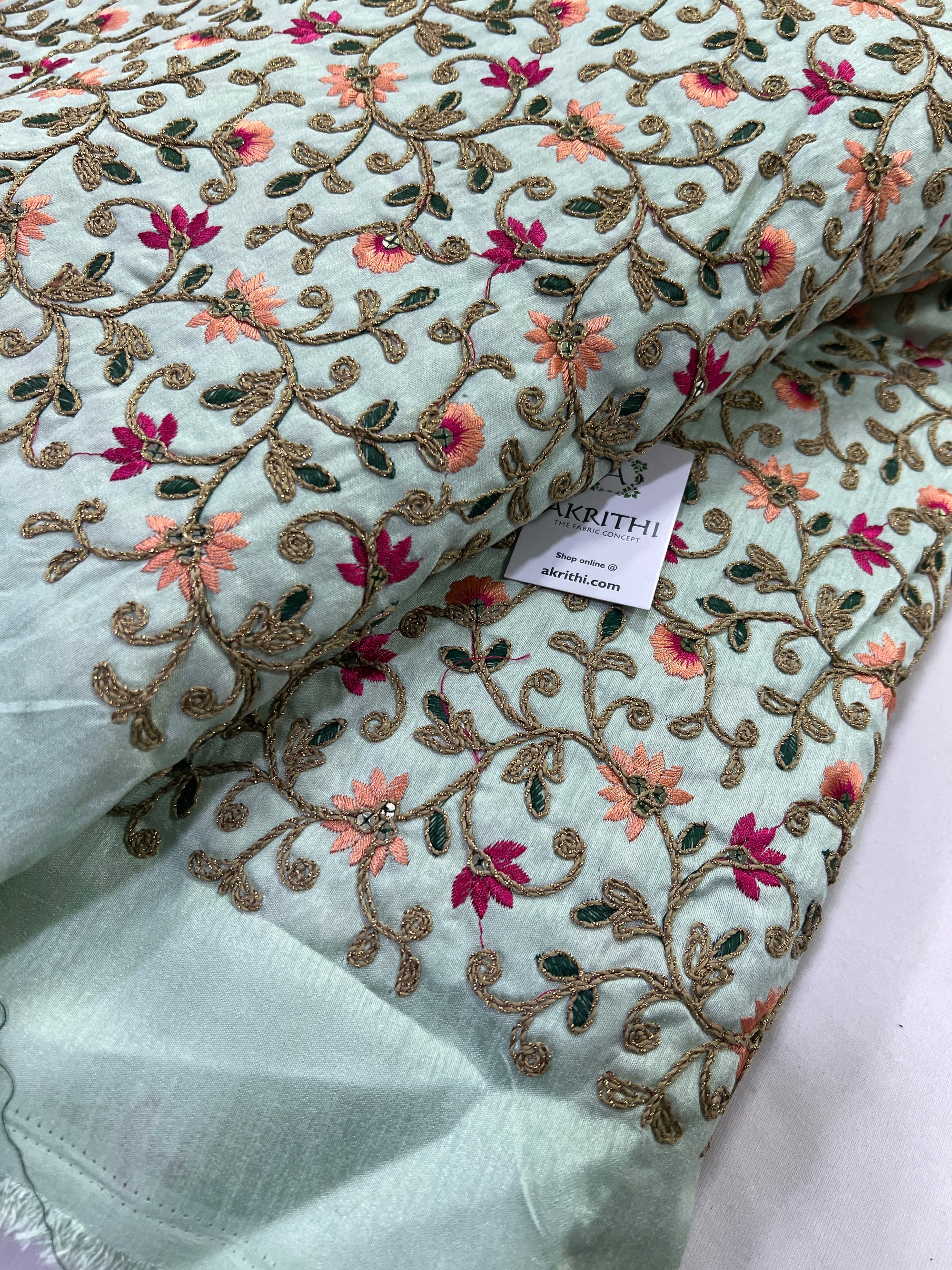 Embroidery on raw silk fabric