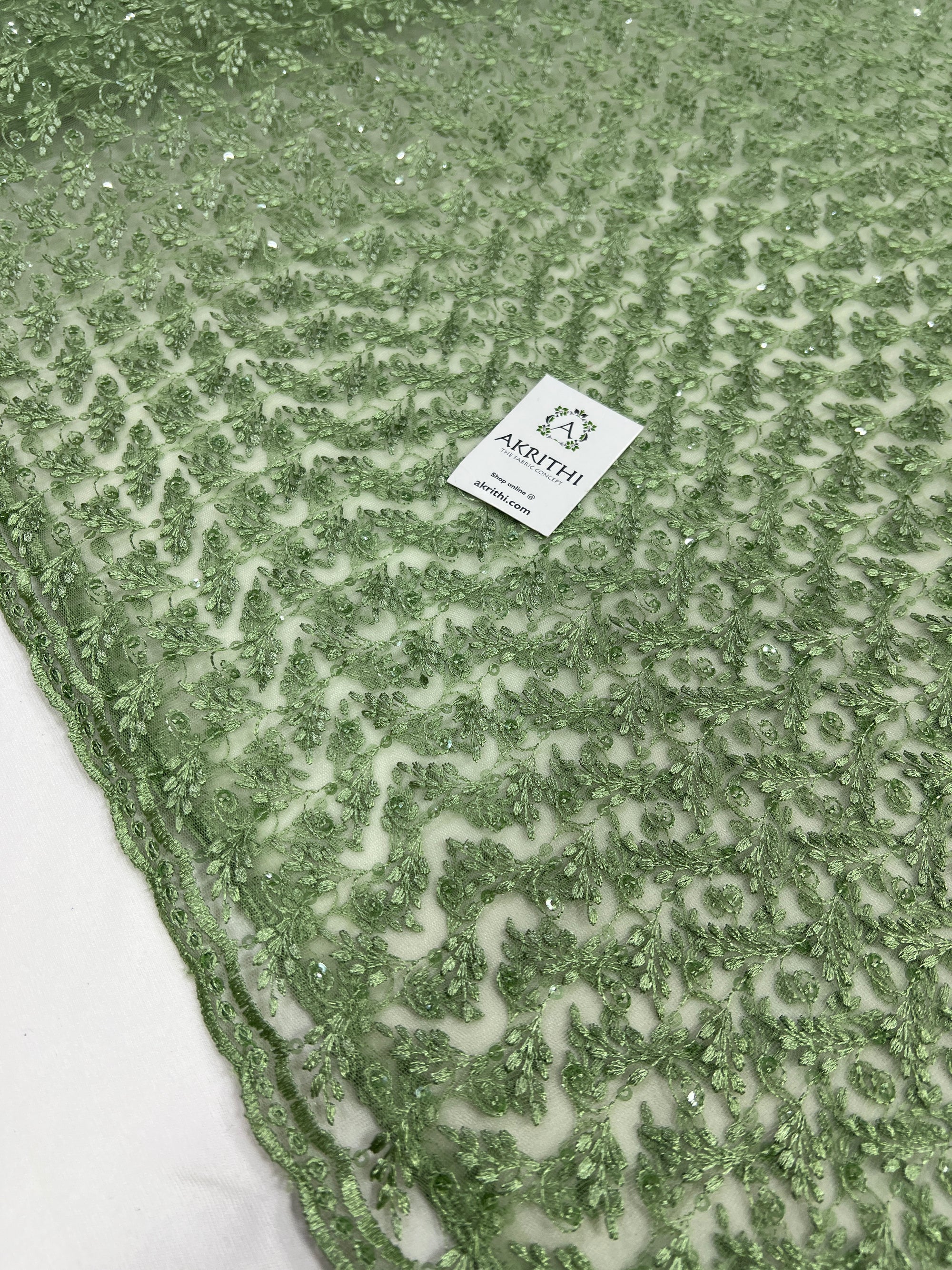 Embroidery on net fabric