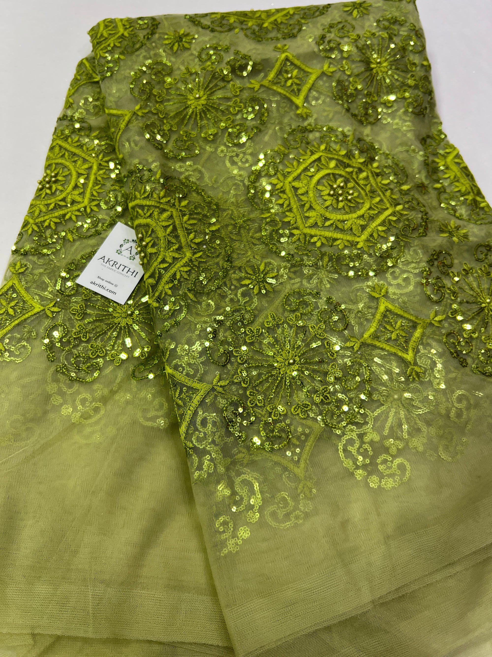Embroidery on net fabric