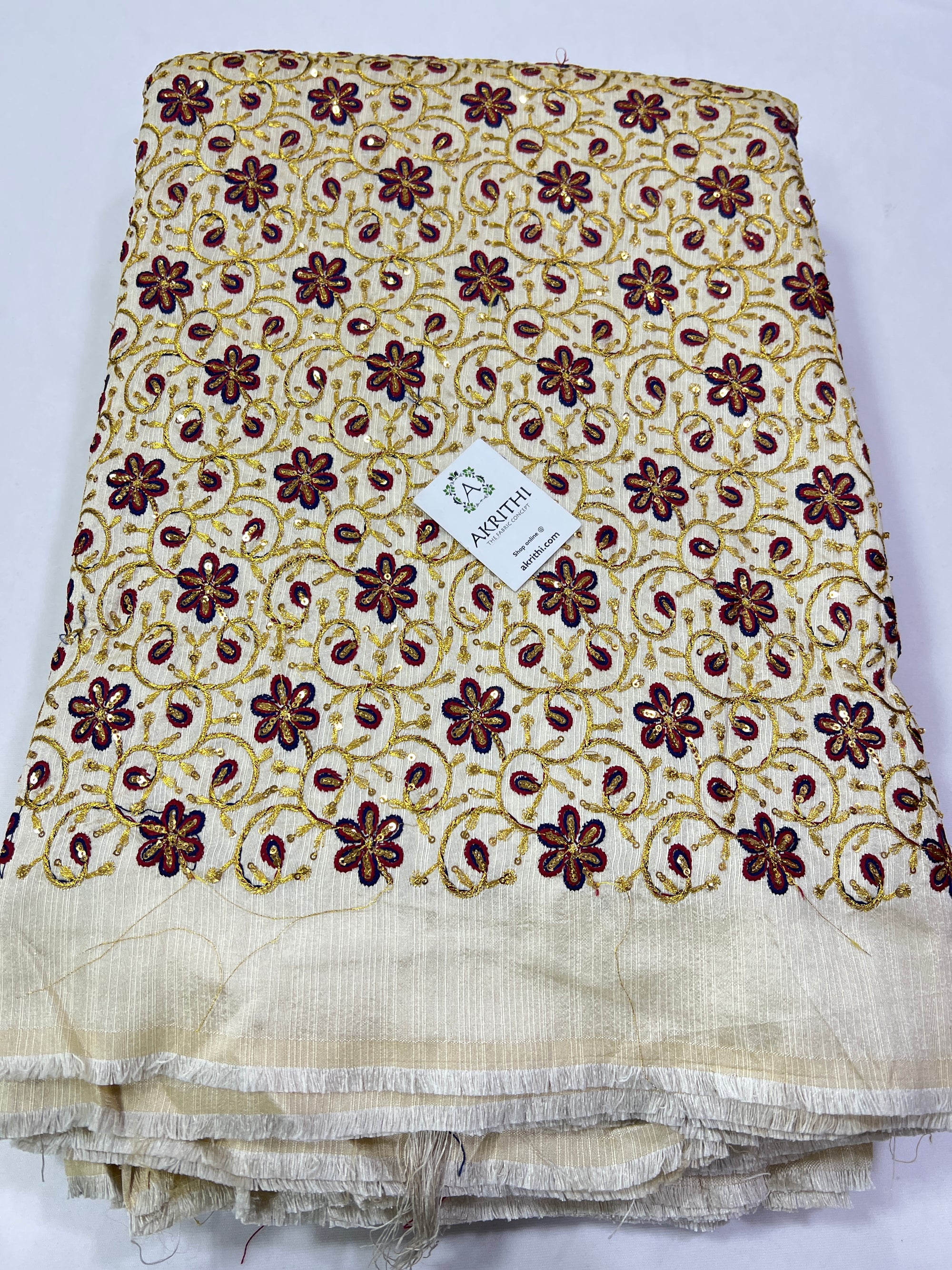 Embroidery on raw silk fabric