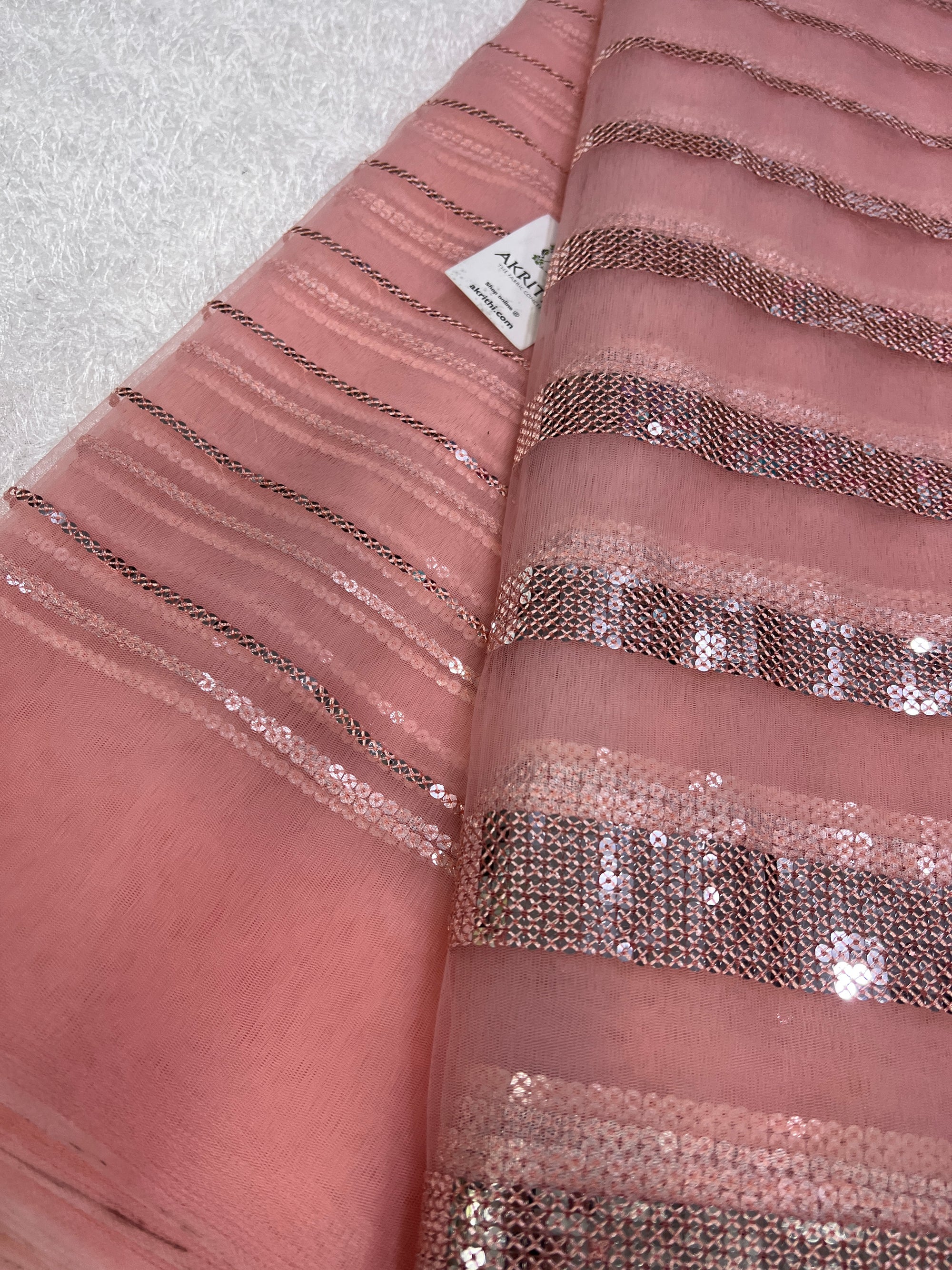 Embroidery on net fabric