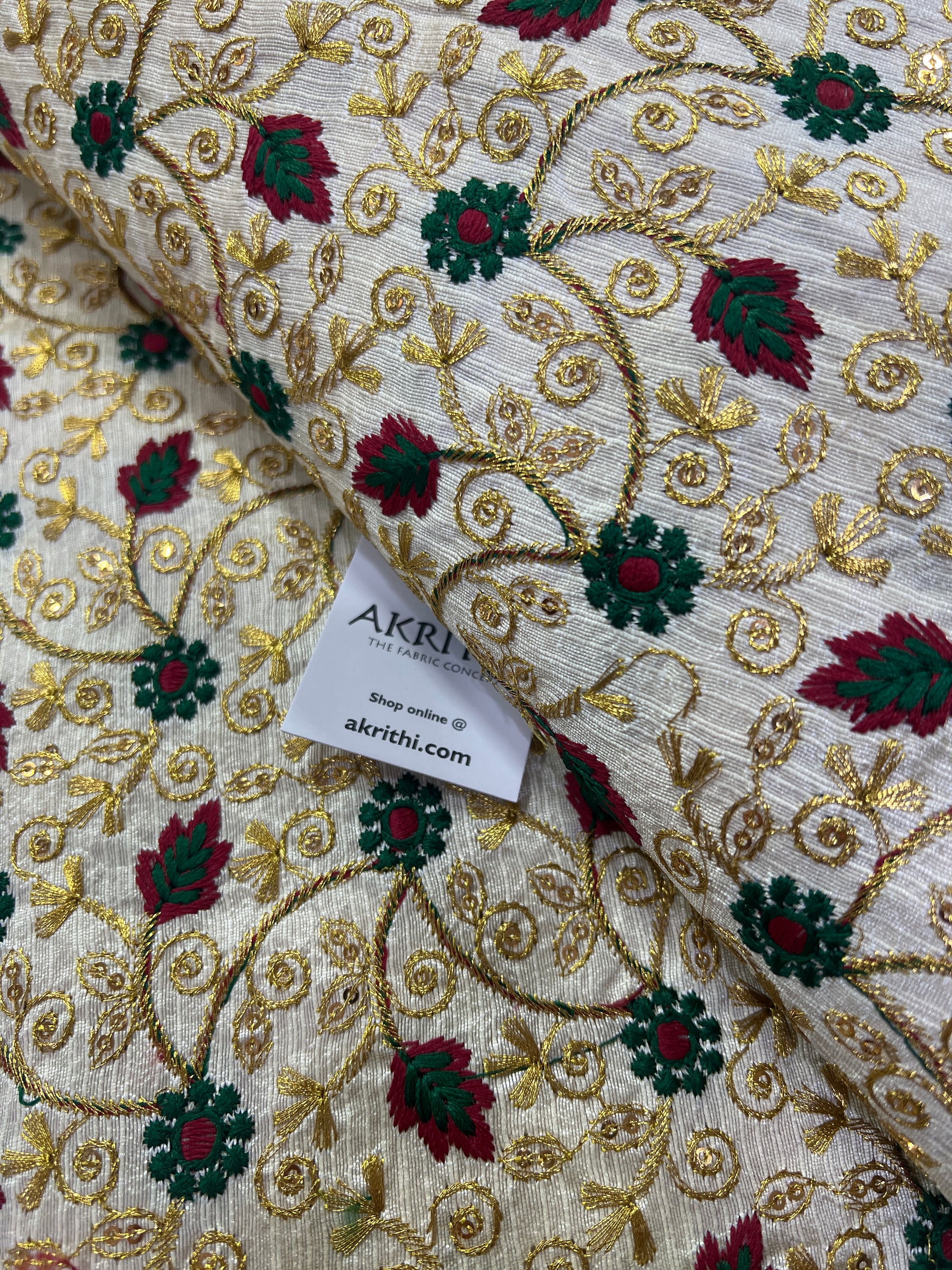 Embroidery on raw silk fabric