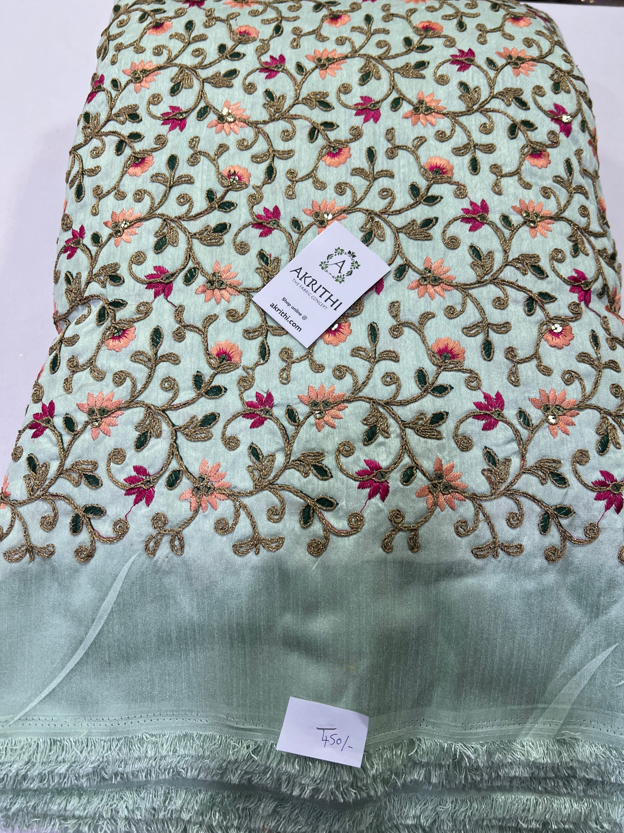 Embroidery on raw silk fabric